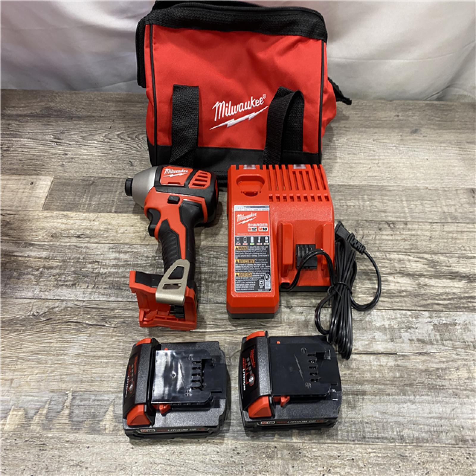 AS-IS Milwaukee 18V Lithium-Ion Cordless 1/4 in. Impact Driver Kit