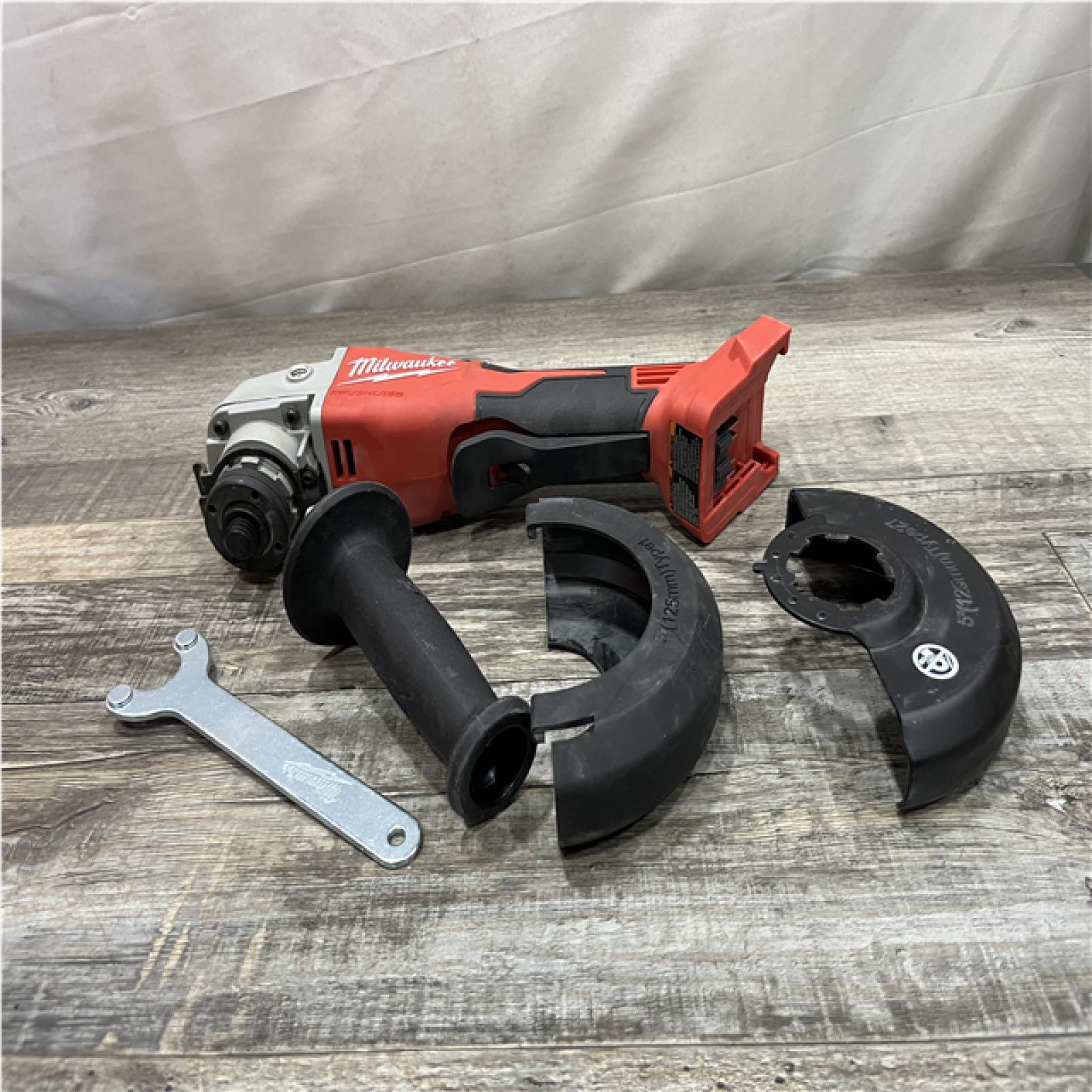 AS-IS Milwaukee 18V Lithium-Ion Brushless Cordless 4-1/2 in./5 in. Grinder w/Paddle Switch (Tool-Only)