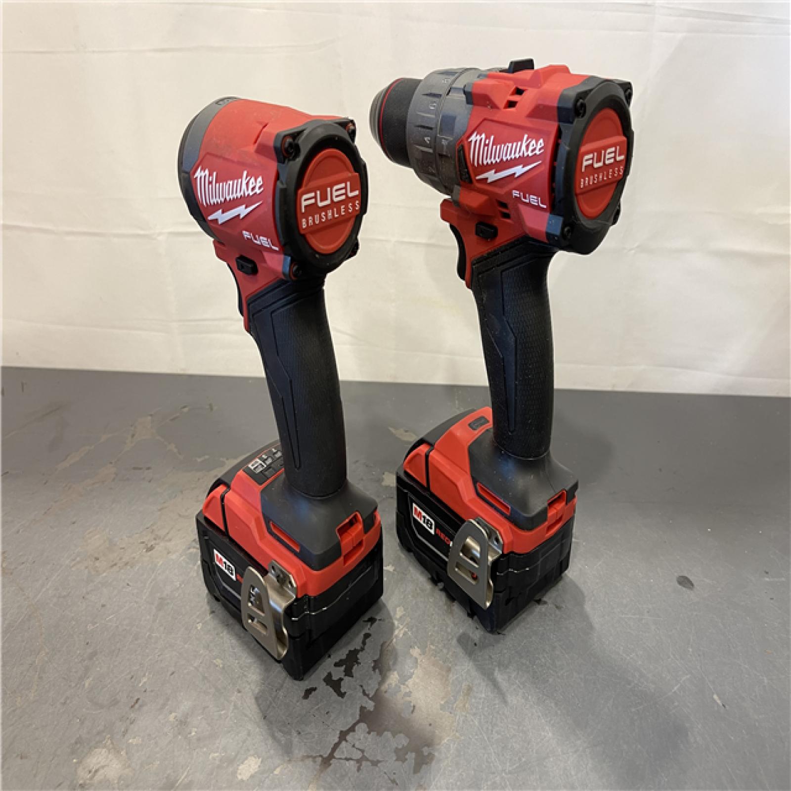 AS-IS - MILWAUKEE FUEL 18V Lithium-Ion Brushless Cordless Hammer Drill and Impact Driver Combo Kit