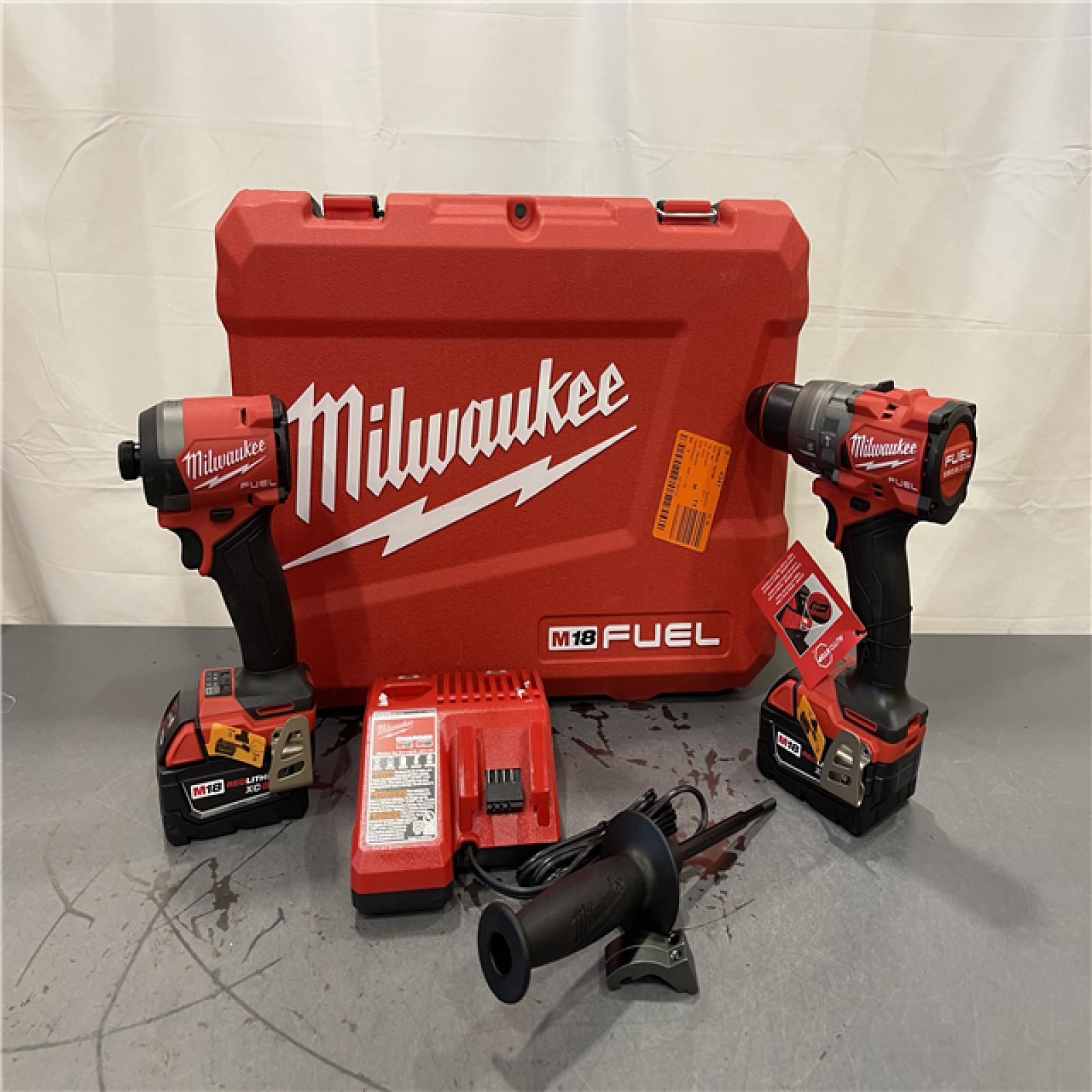 AS-IS - MILWAUKEE FUEL 18V Lithium-Ion Brushless Cordless Hammer Drill and Impact Driver Combo Kit