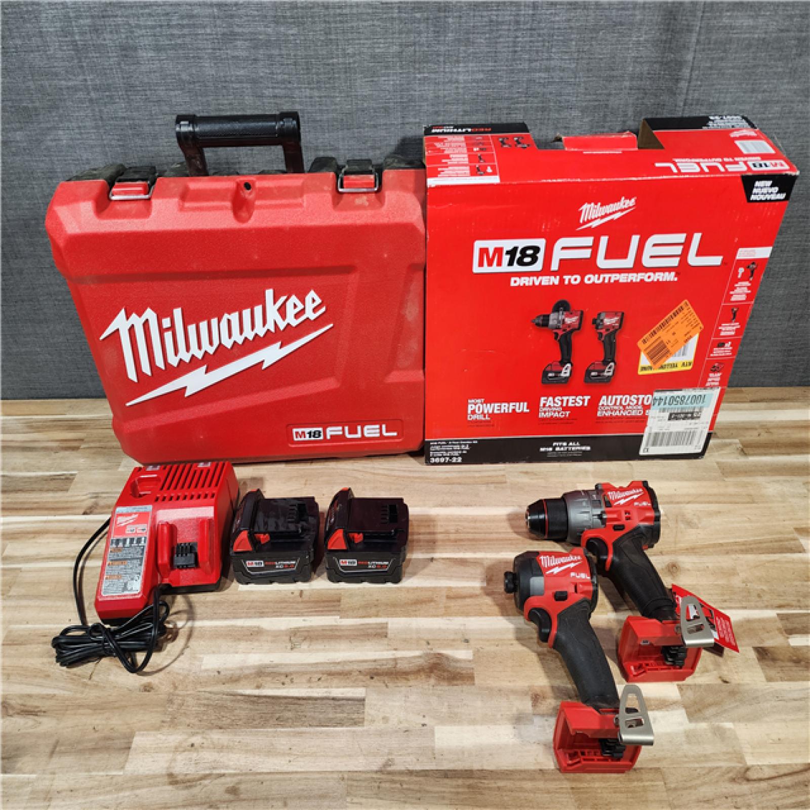 HOUSTON LOCATION - AS-IS Milwaukee FUEL 18V Lithium-Ion Brushless Cordless Hammer Drill and Impact Driver Combo Kit