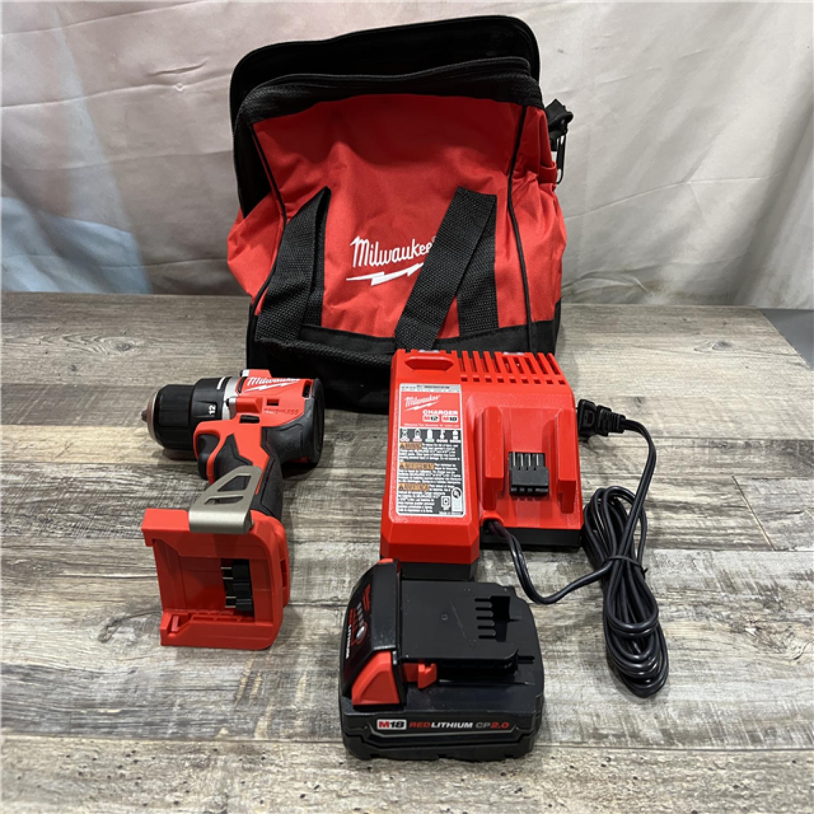 AS-IS Milwaukee 18V Lithium-Ion Brushless Cordless 1/2 in. Compact Drill/Driver with kit