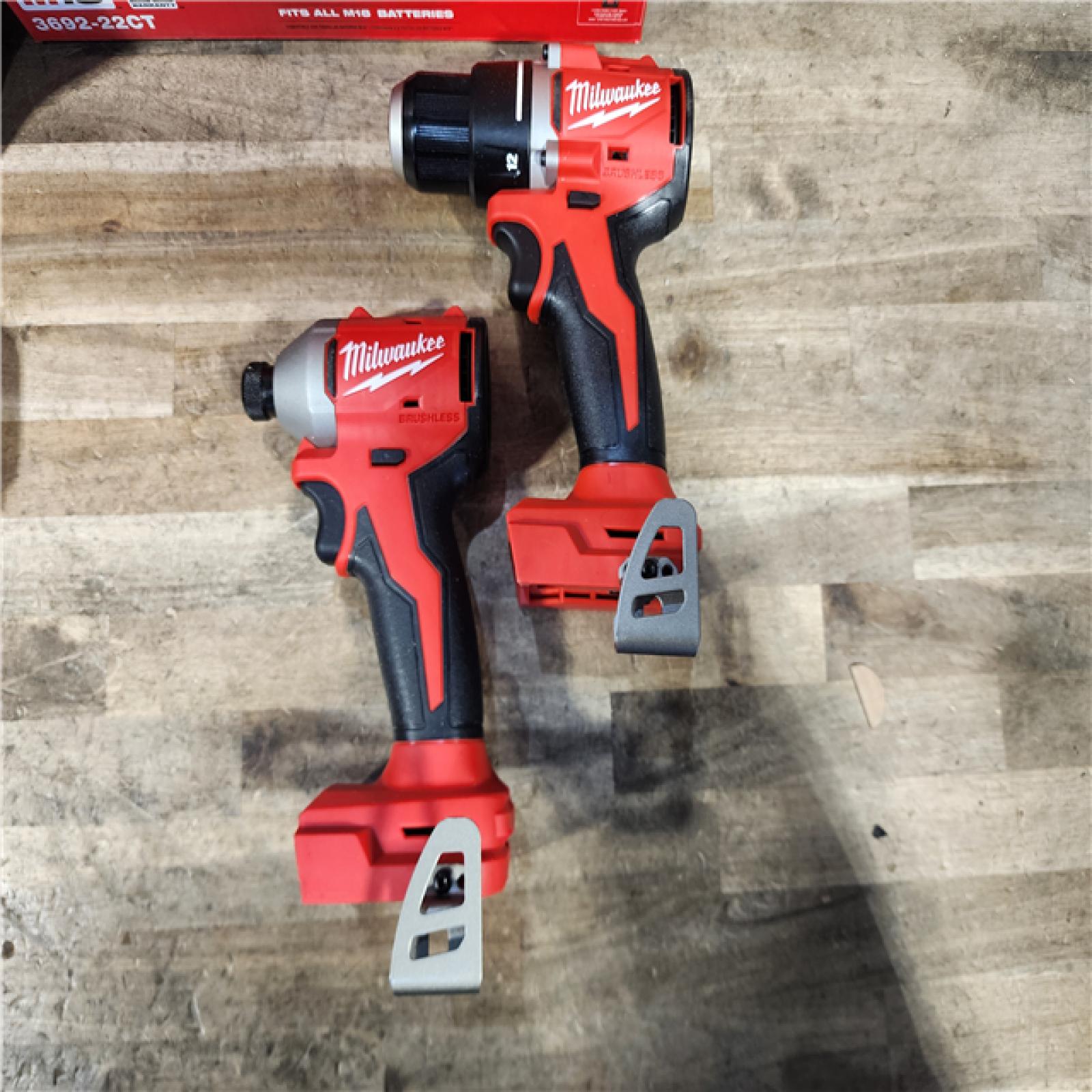 HOUSTON LOCATION - AS-IS Milwaukee M18 18V Lithium-Ion Brushless Cordless Compact Drill/Impact Combo Kit (2-Tool) W/(2) 2.0 Ah Batteries  Charger & Bag