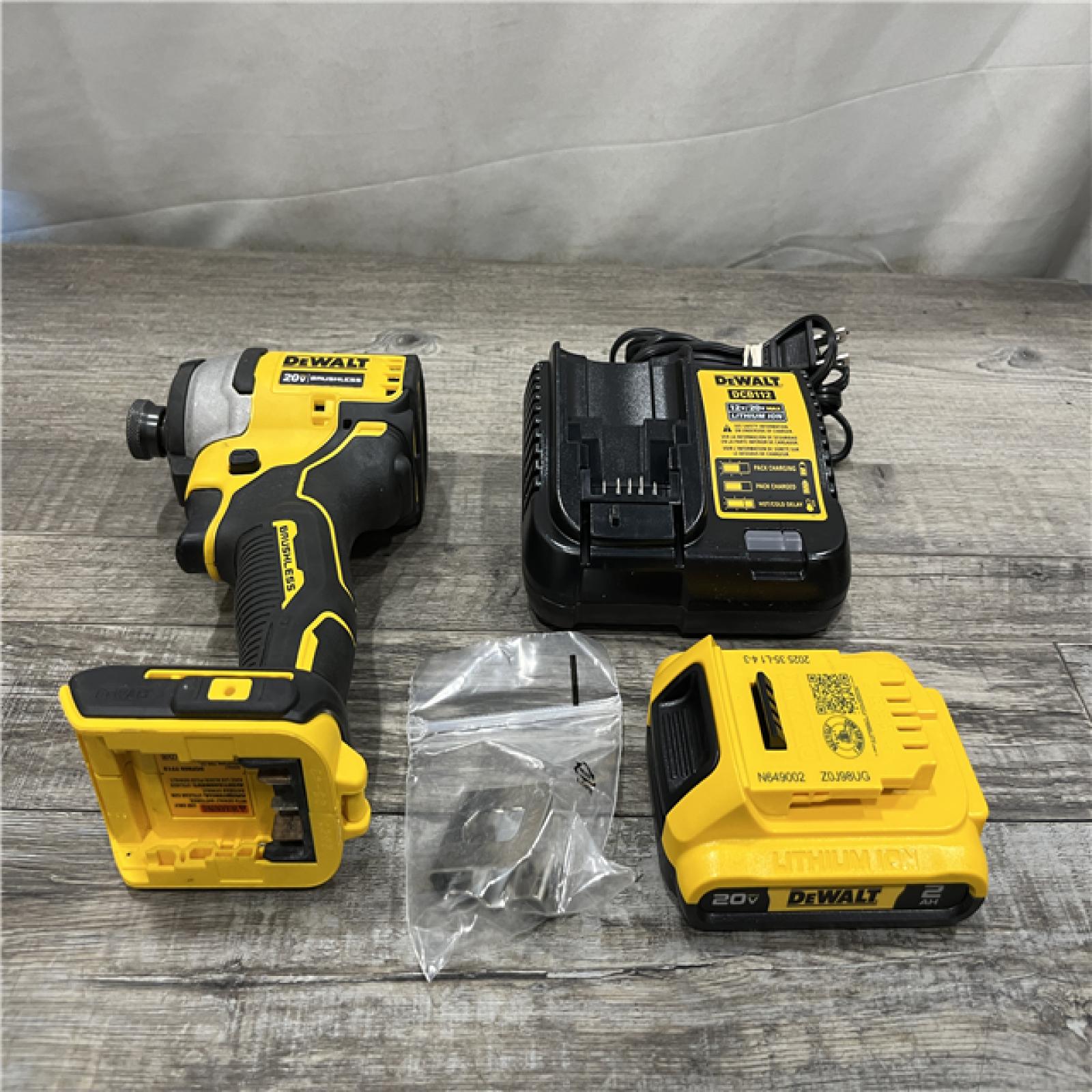 AS-IS DEWALT Atomic 20V Max Lithium-Ion Brushless Cordless Compact 1/4 in. Impact Driver Kit