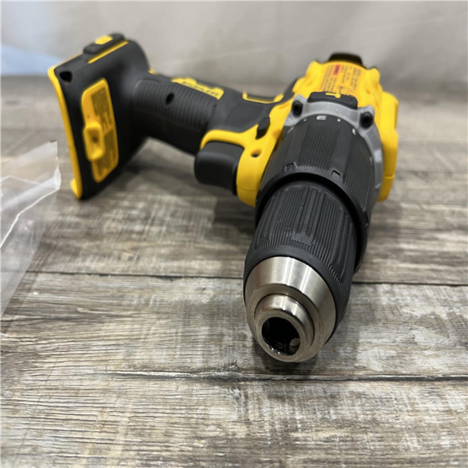 AS-IS DEWALT ATOMIC 20-Volt MAX Brushless Cordless 1/2 in. Hammer Drill (Tool-Only)