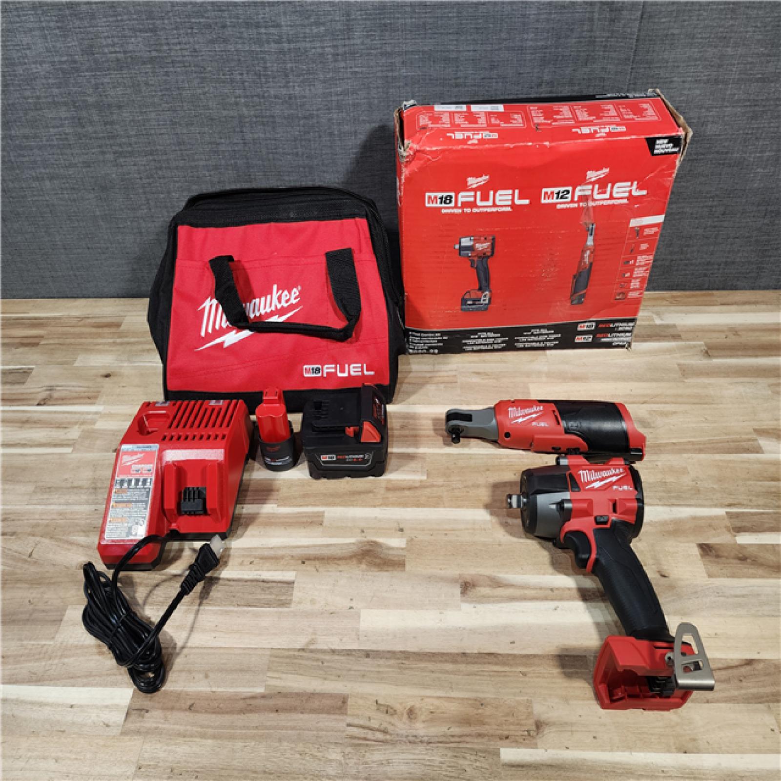 HOUSTON LOCATION - AS-IS Milwaukee FUEL 18V Cordless Mid Torque 1/2 in. Impact Wrench w/ M12 FUEL 3/8 in. Ratchet & Battery/Charger Combo Kit