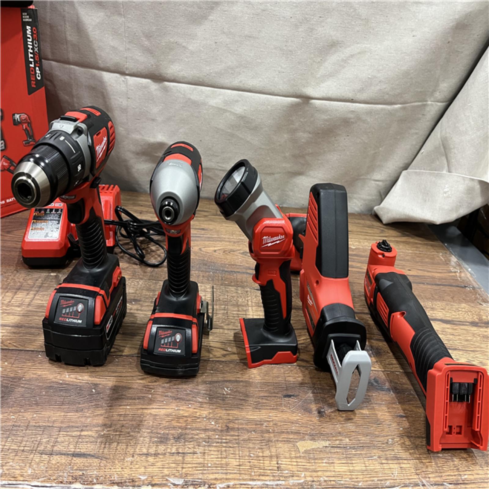 AS-IS Milwaukee M18 18V Lithium-Ion Cordless Combo Kit (5-Tool) with (2) Batteries, Charger and Tool Bag