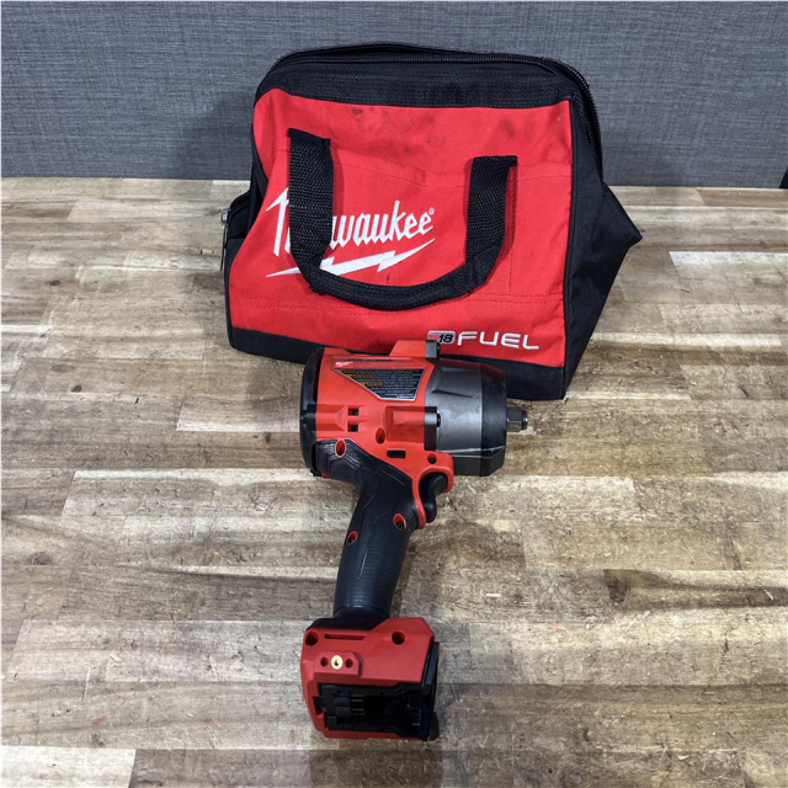 Houston Location AS-IS  Milwaukee FUEL Impact wrench