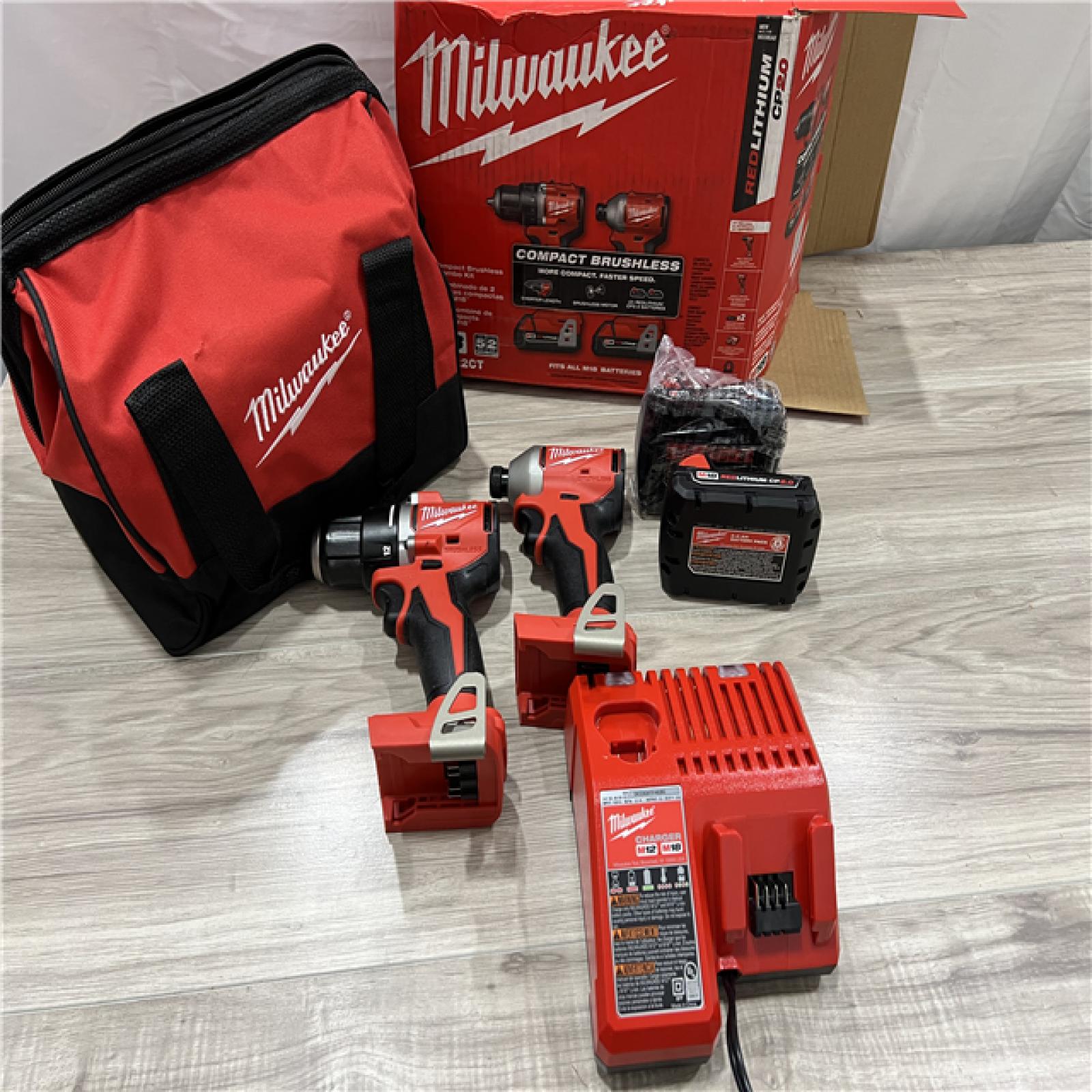 AS-IS Milwaukee M18 18V Lithium-Ion Brushless Cordless Compact Drill/Impact Combo Kit
