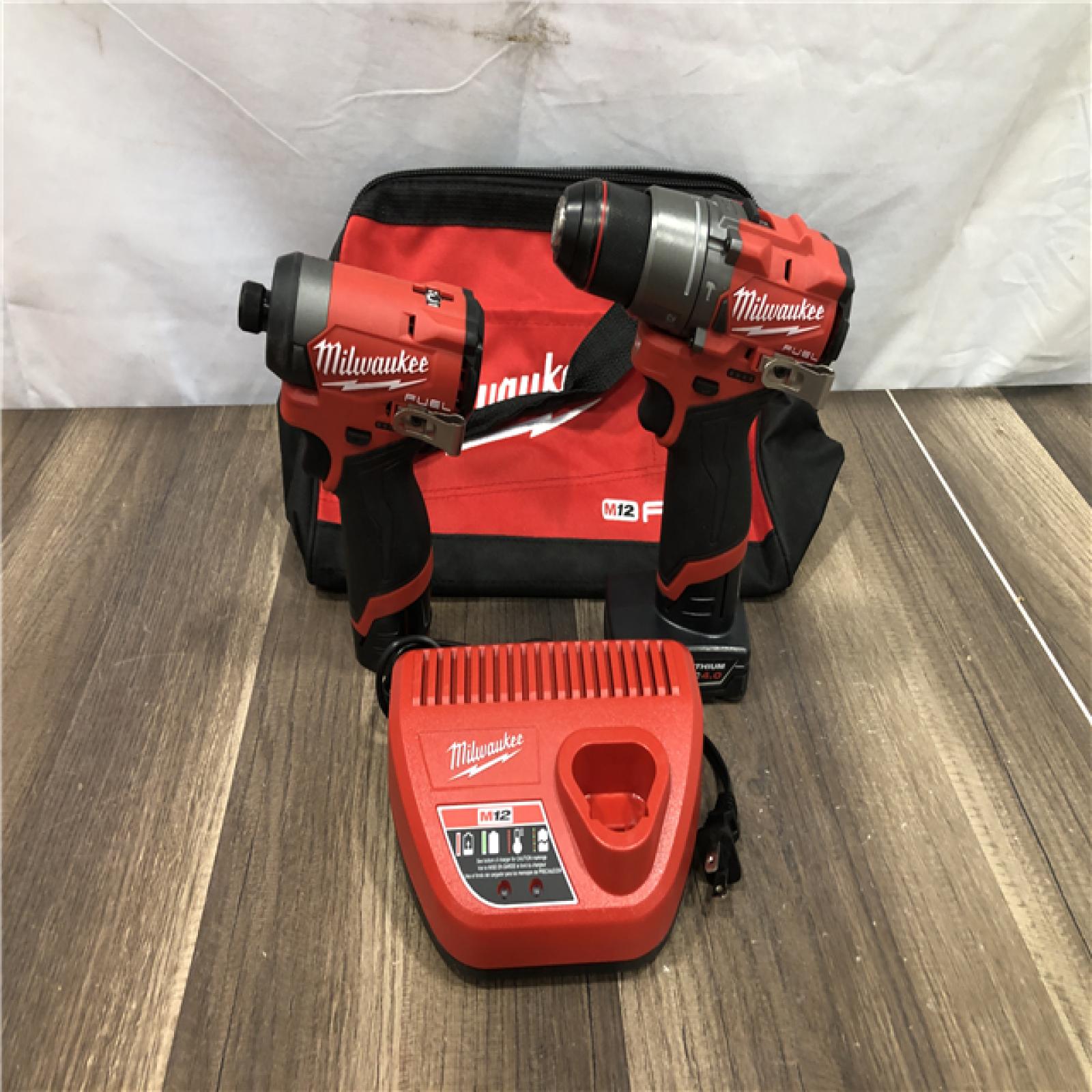 AS-IS Milwaukee FUEL 12-Volt Lithium-Ion Brushless Cordless Hammer Drill and Impact Driver Combo Kit