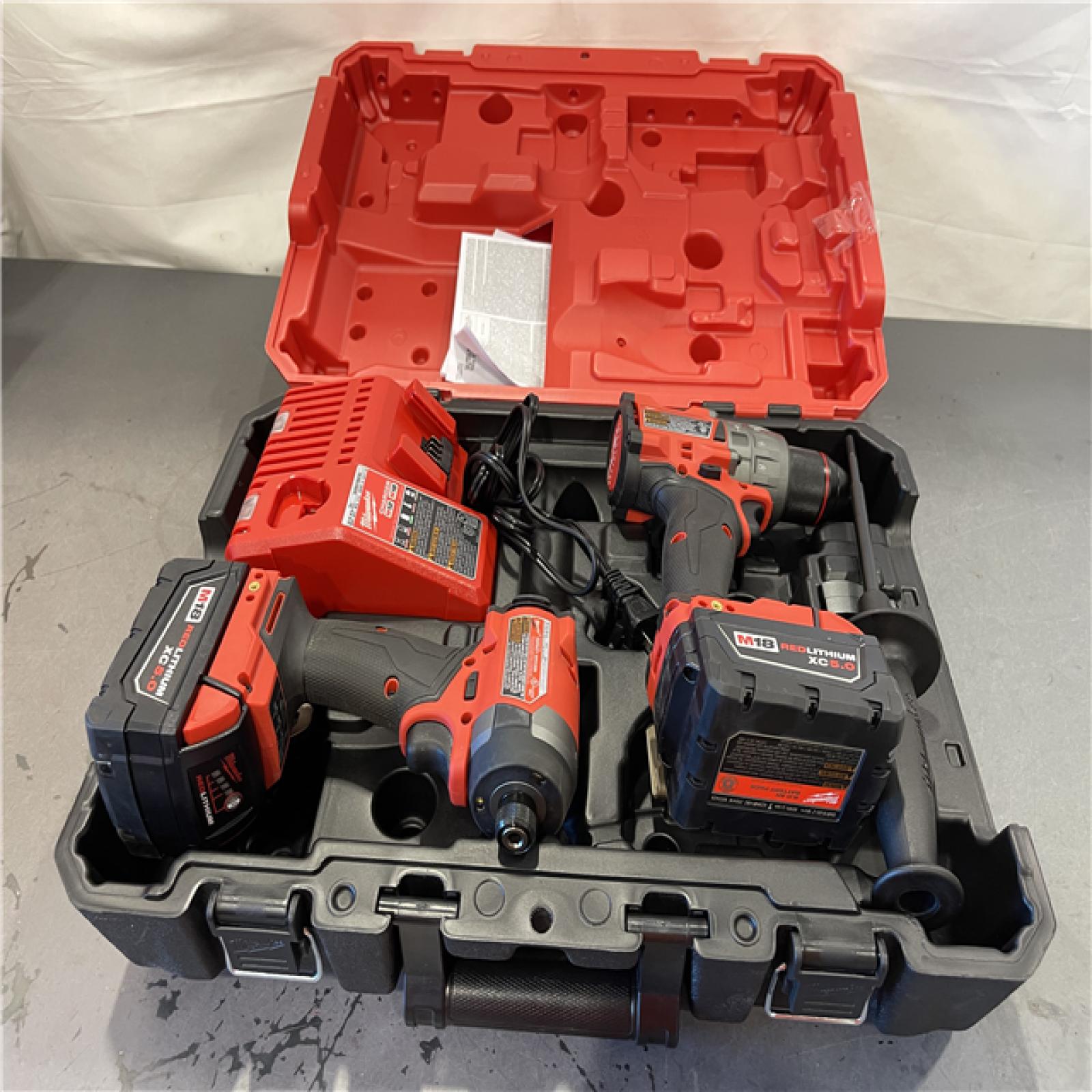 AS-IS - MILWAUKEE FUEL 18V Lithium-Ion Brushless Cordless Hammer Drill and Impact Driver Combo Kit (2 Tool)