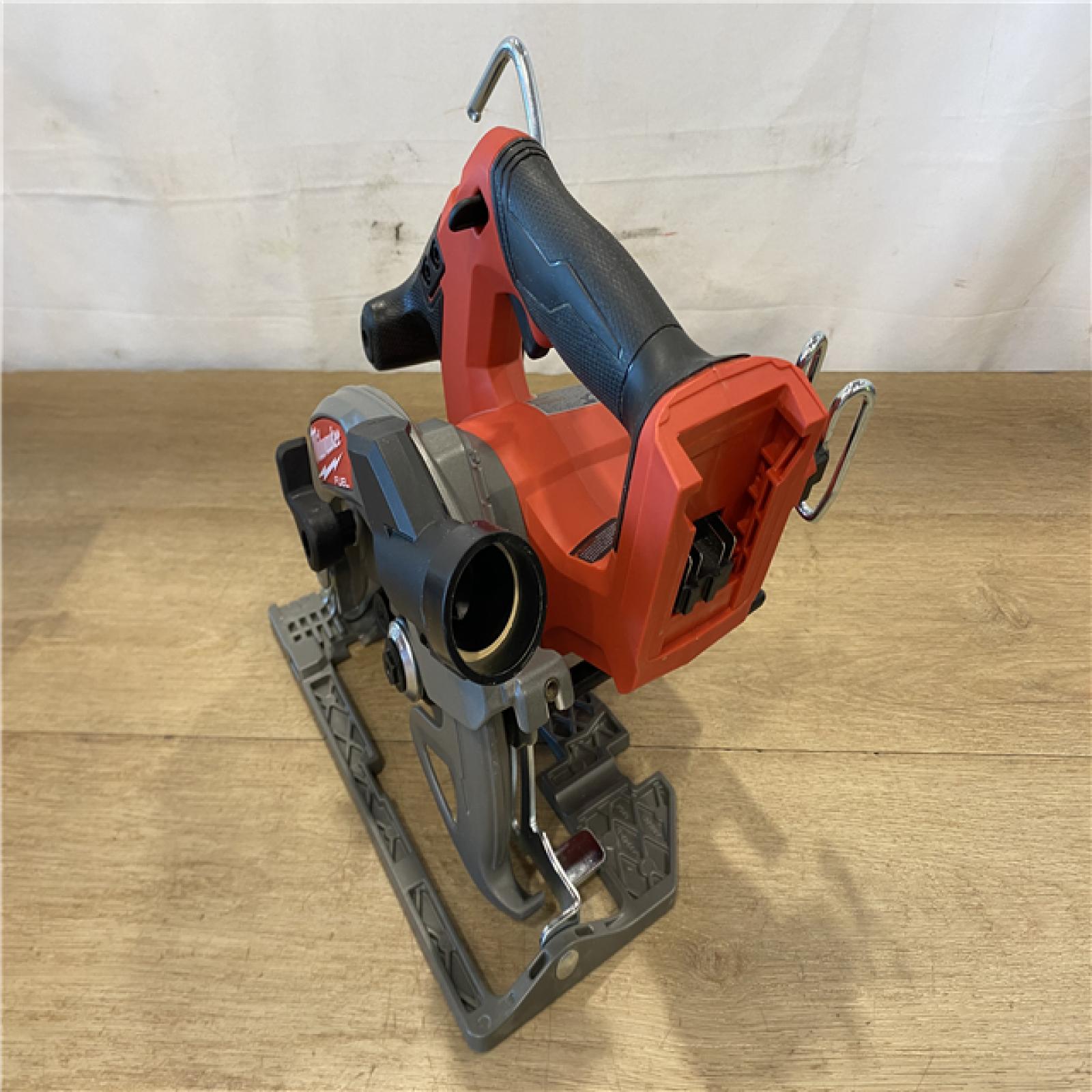 AS-IS Milwaukee FUEL 18V Lithium-Ion Brushless Cordless 6-1/2 in. Circular Saw (Tool-Only)