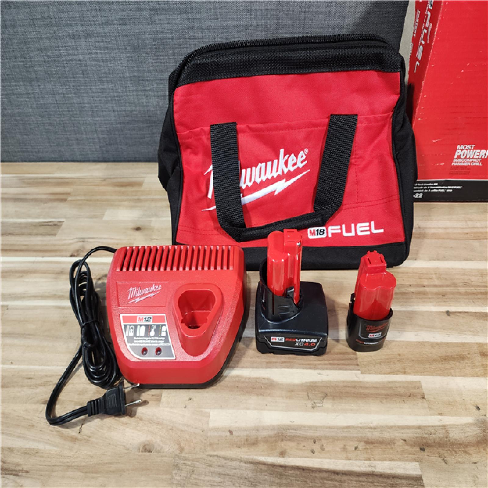 HOUSTON LOCATION - AS-IS Milwaukee FUEL 12-Volt Lithium-Ion Brushless Cordless Hammer Drill and Impact Driver Combo Kit