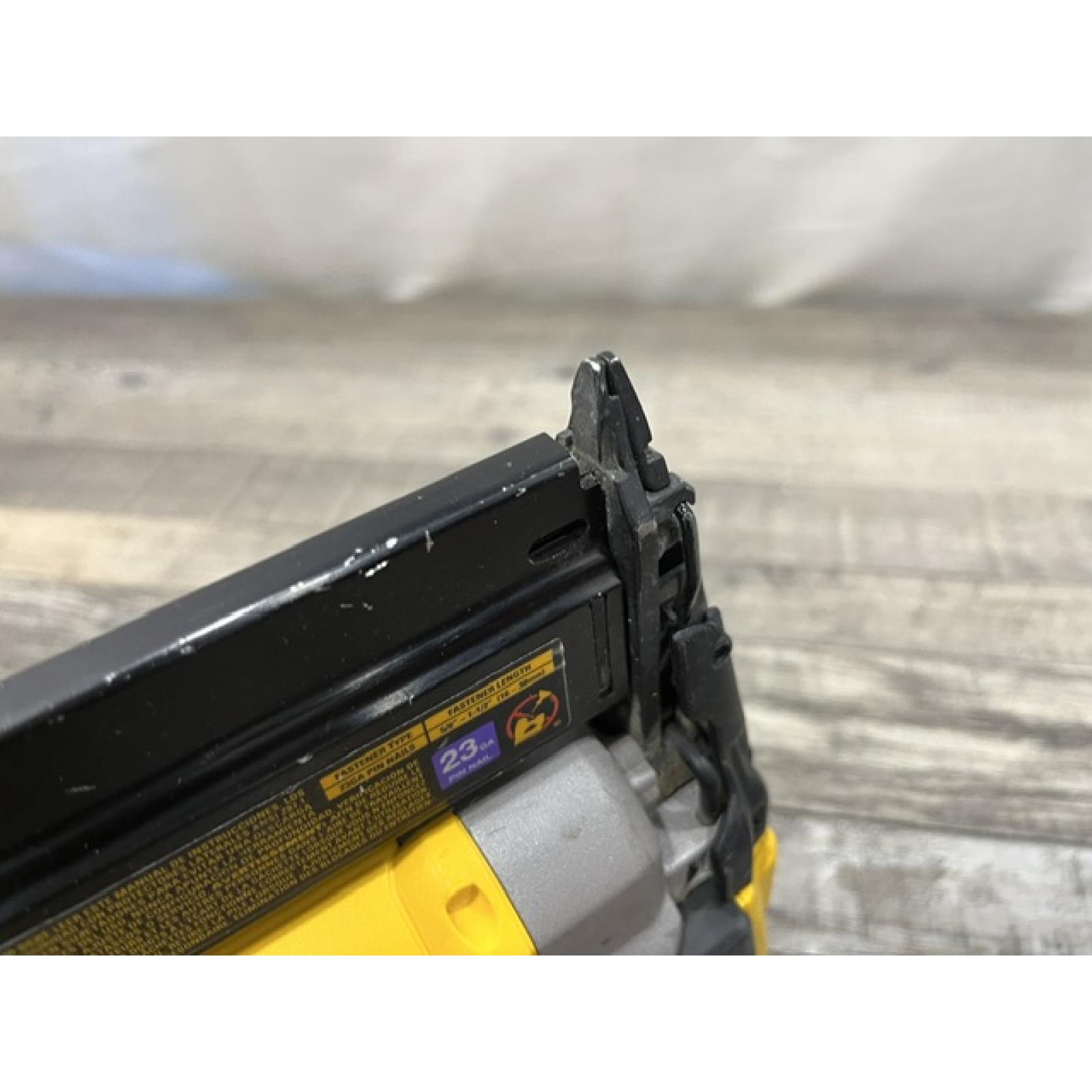 AS-IS DEWALT ATOMIC 20V MAX Lithium Ion Cordless 23 Gauge Pin Nailer (Tool Only)