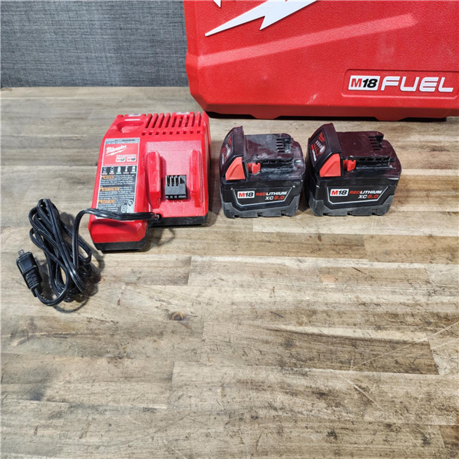 HOUSTON LOCATION - AS-IS Milwaukee FUEL 18V Lithium-Ion Brushless Cordless Hammer Drill and Impact Driver Combo Kit