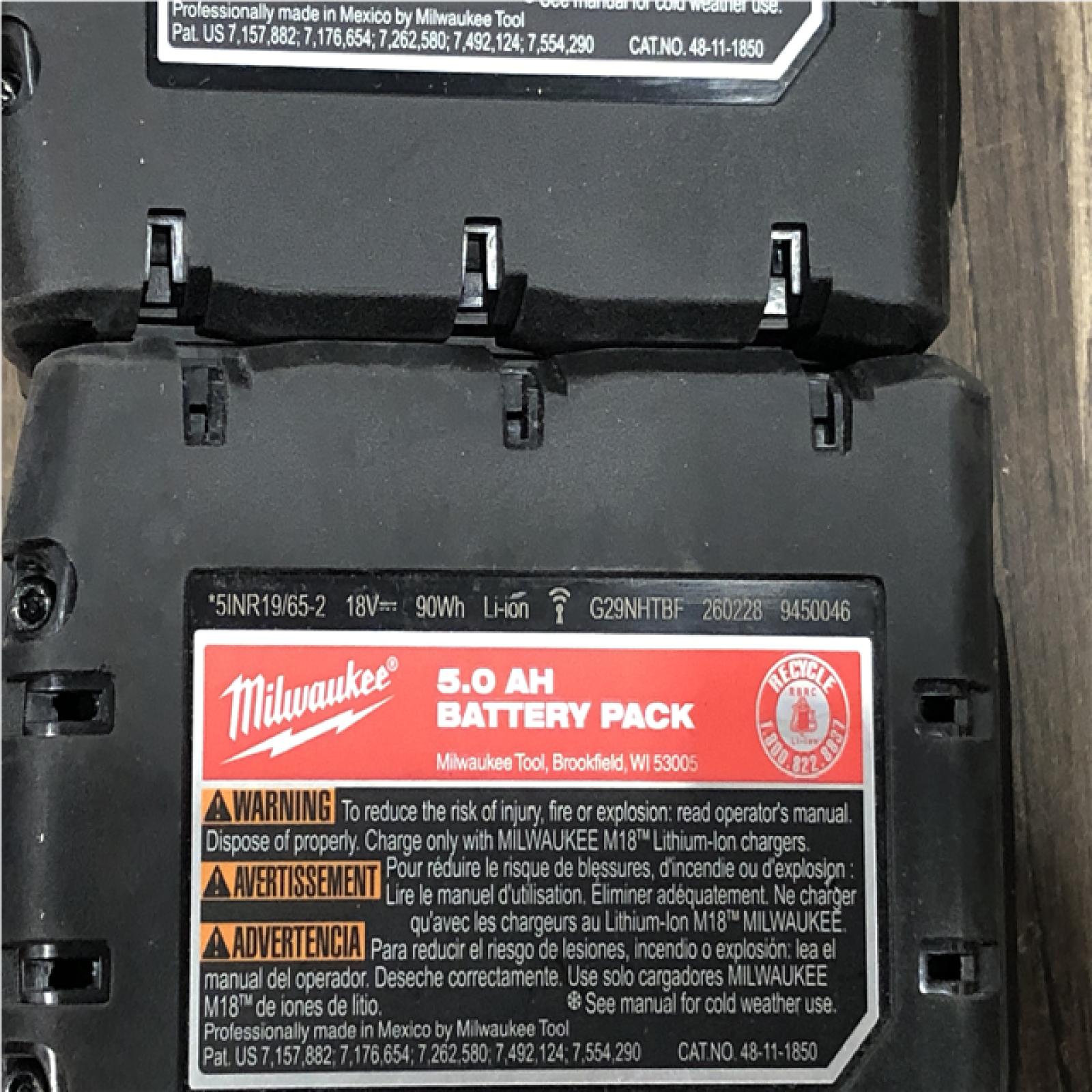 AS-IS Milwaukee 18-Volt Lithium-Ion XC Starter Kit with (2) 5.0Ah Batteries and Charger