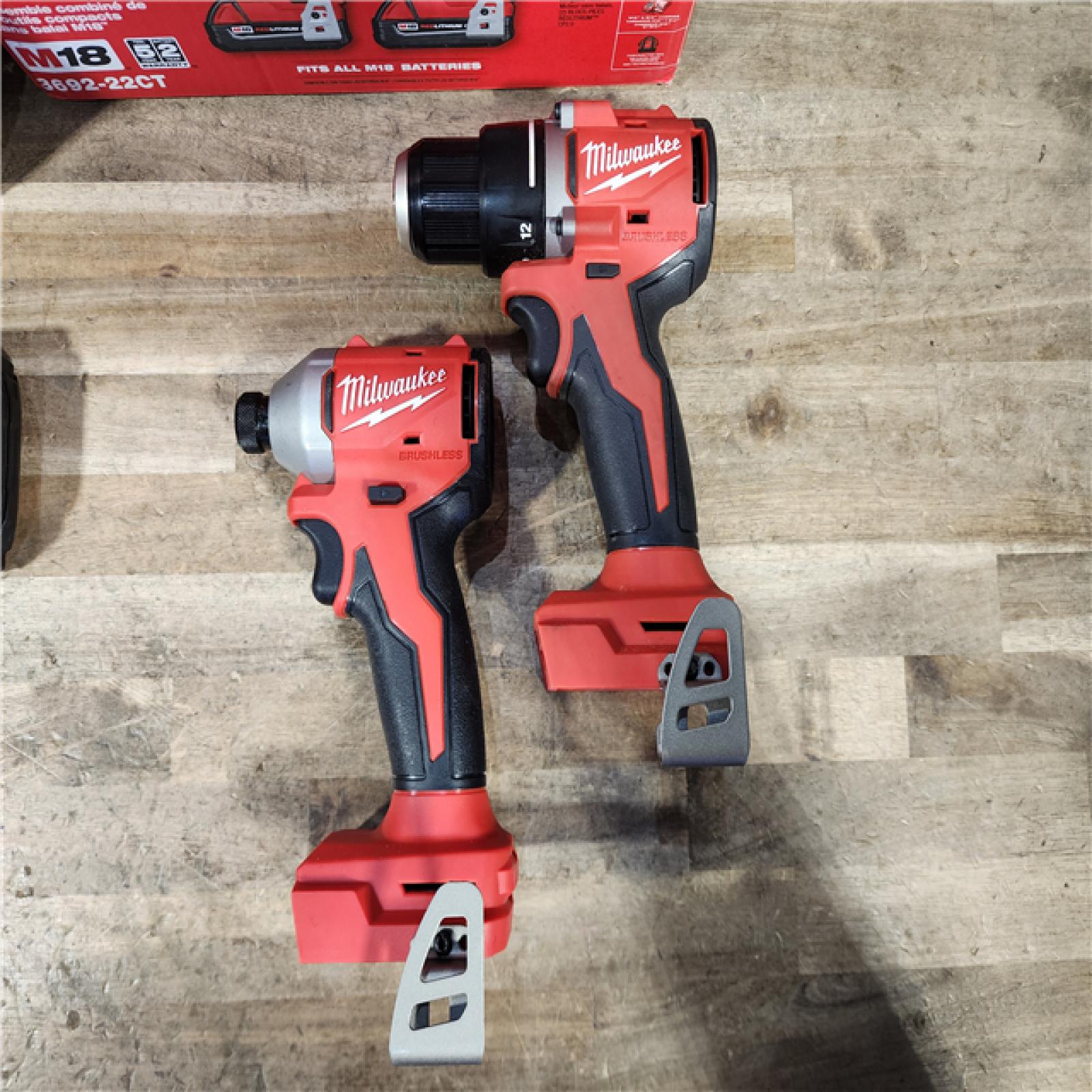 HOUSTON LOCATION - AS-IS Milwaukee M18 18V Lithium-Ion Brushless Cordless Compact Drill/Impact Combo Kit (2-Tool) W/(2) 2.0 Ah Batteries  Charger & Bag