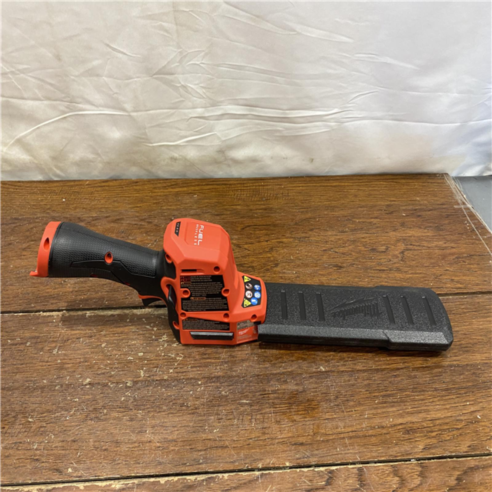 AS-IS Milwaukee M12 FUEL 8 in. 12V Lithium-Ion Brushless Cordless Battery Hedge Trimmer (Tool-Only)