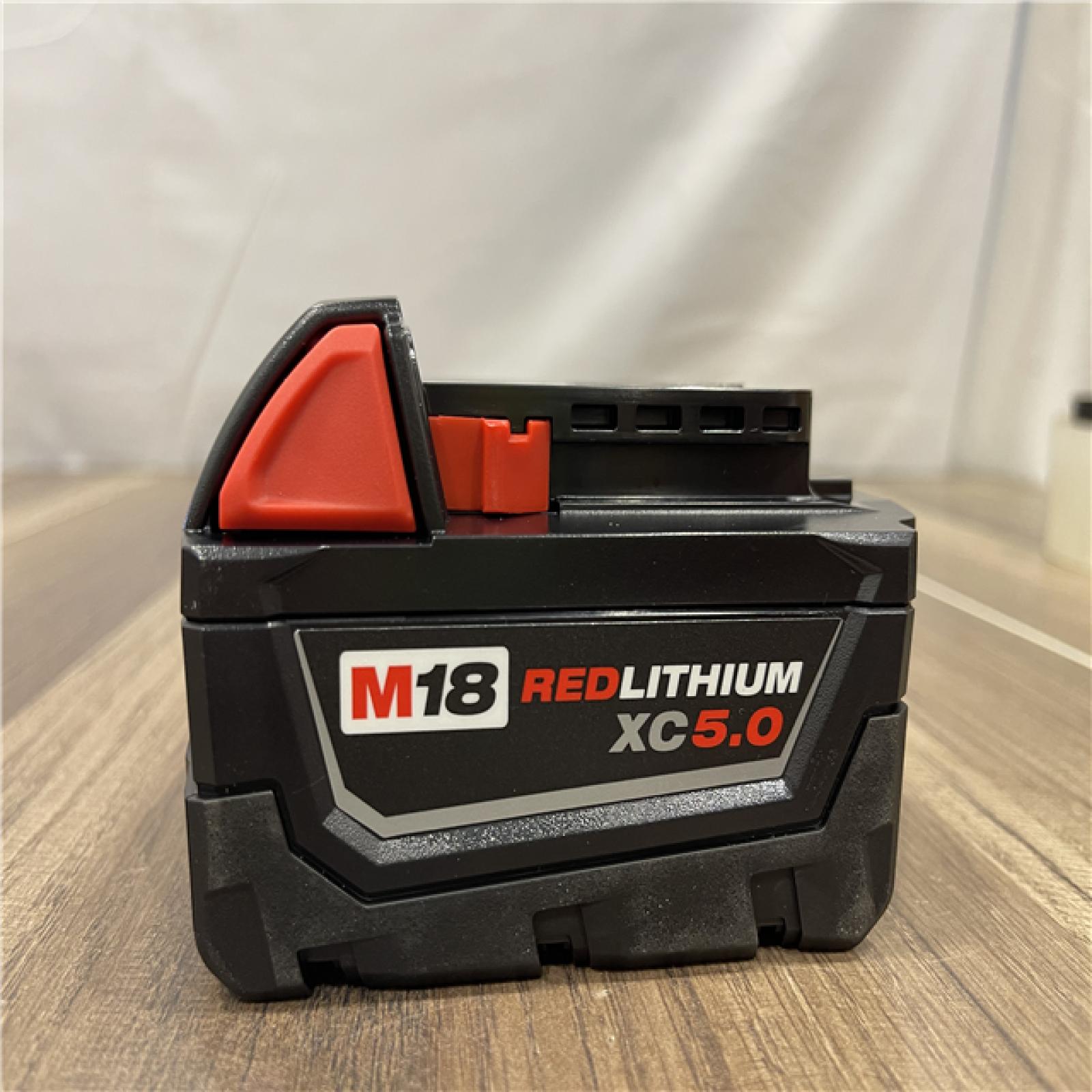 AS-IS Milwaukee M18 18-Volt Lithium-Ion XC Starter Kit with Two 5.0Ah Batteries and Charger