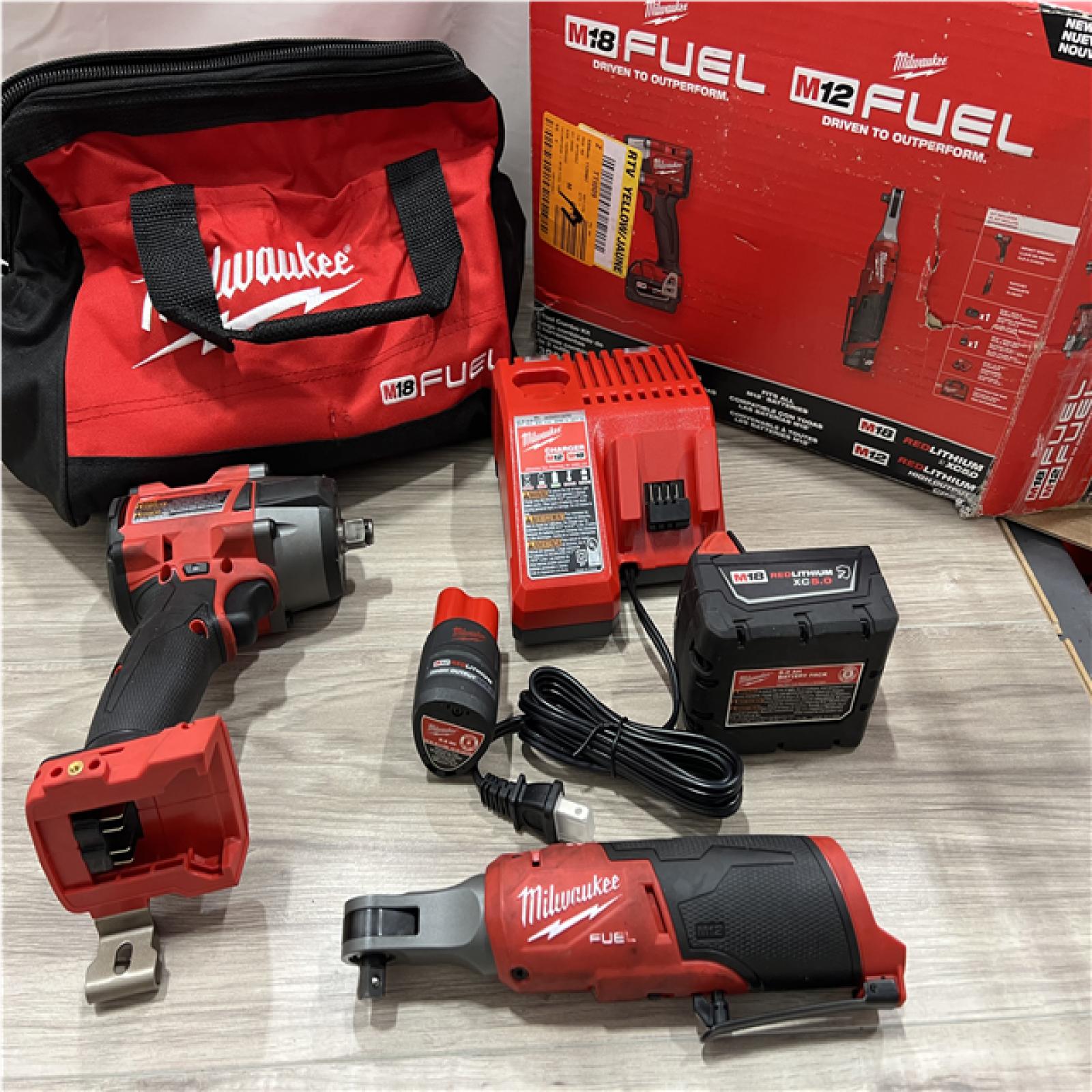 AS-IS Milwaukee FUEL 18V Cordless Mid Torque 1/2 in. Impact Wrench w/ 12 FUEL 3/8 in. Ratchet Combo Kit