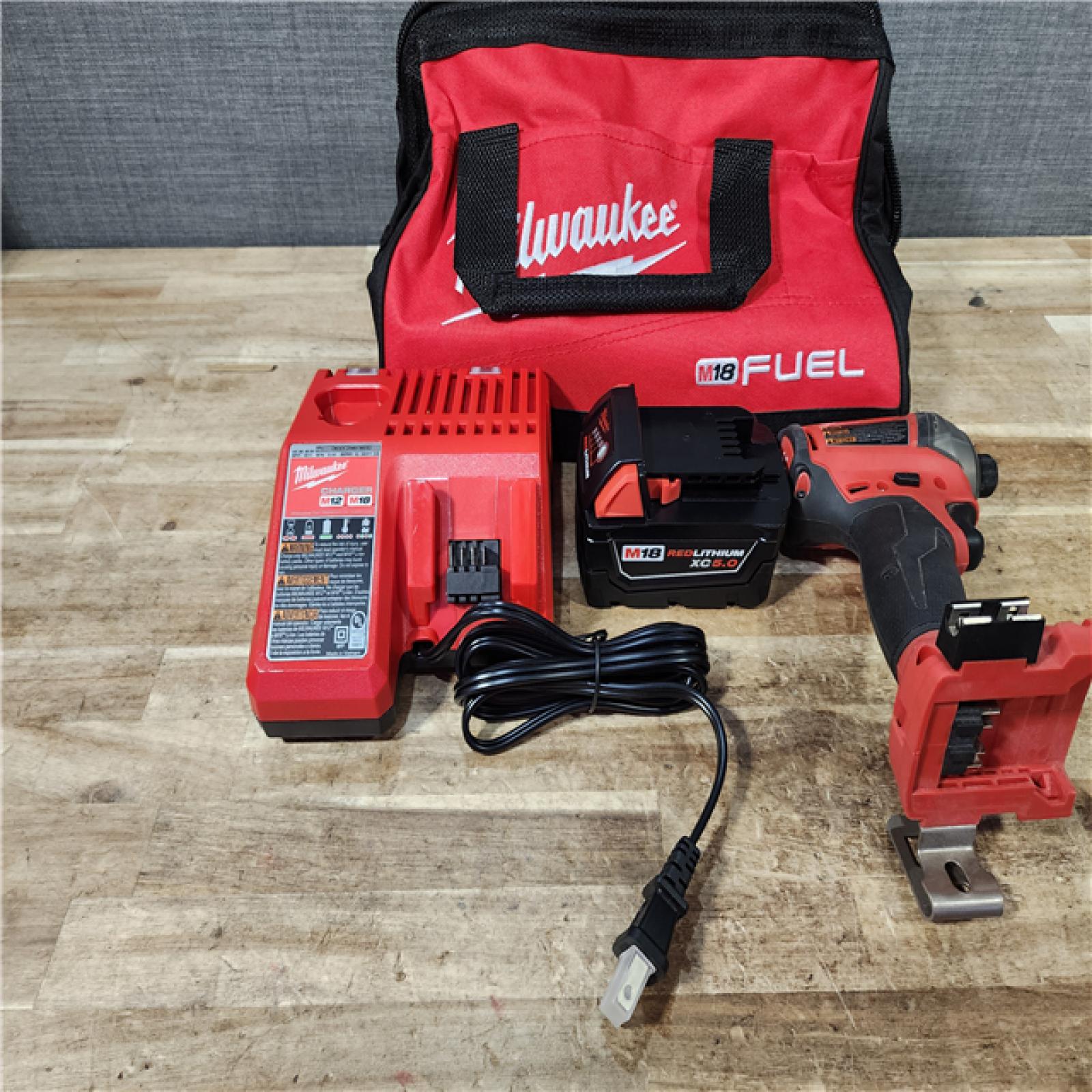 HOUSTON LOCATION - AS - IS Milwaukee FUEL SURGE 18V Lithium-Ion Brushless Cordless 1/4 in. Hex Impact Driver Kit