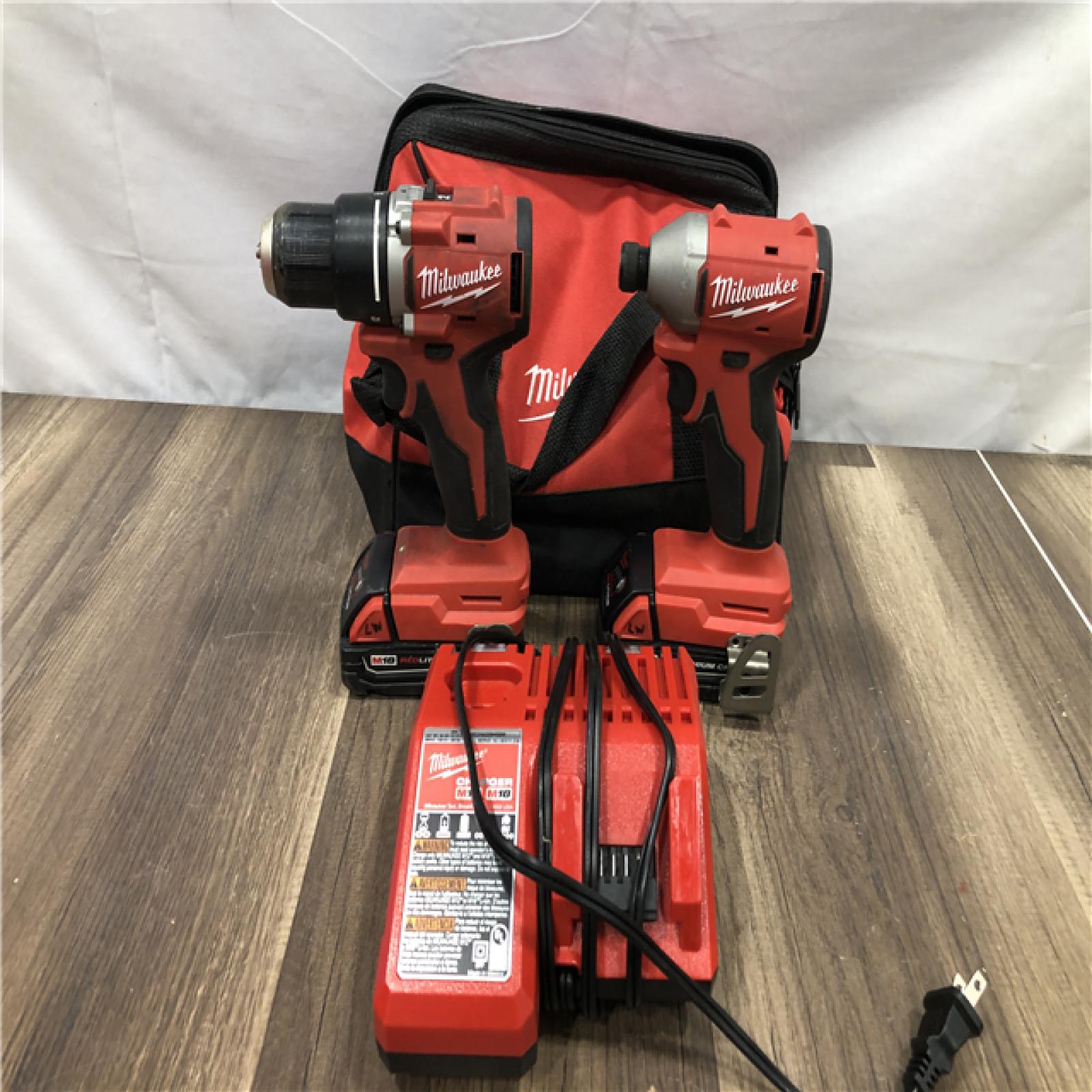 AS-IS Milwaukee 18V Lithium-Ion Brushless Cordless Compact Drill/Impact Combo Kit