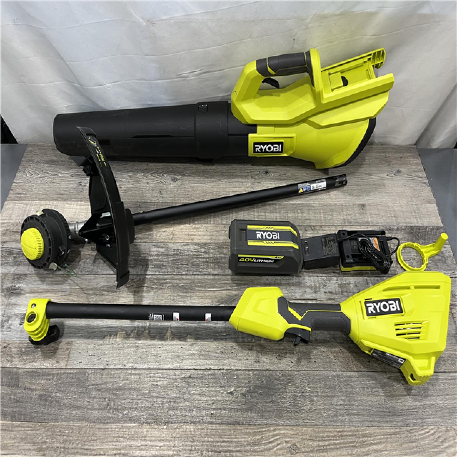 AS-IS RYOBI 40V Cordless Attachment Capable 15 String Trimmer & 550 CFM 120 MPH Blower Combo Kit with 4.0 Ah Battery & Charger