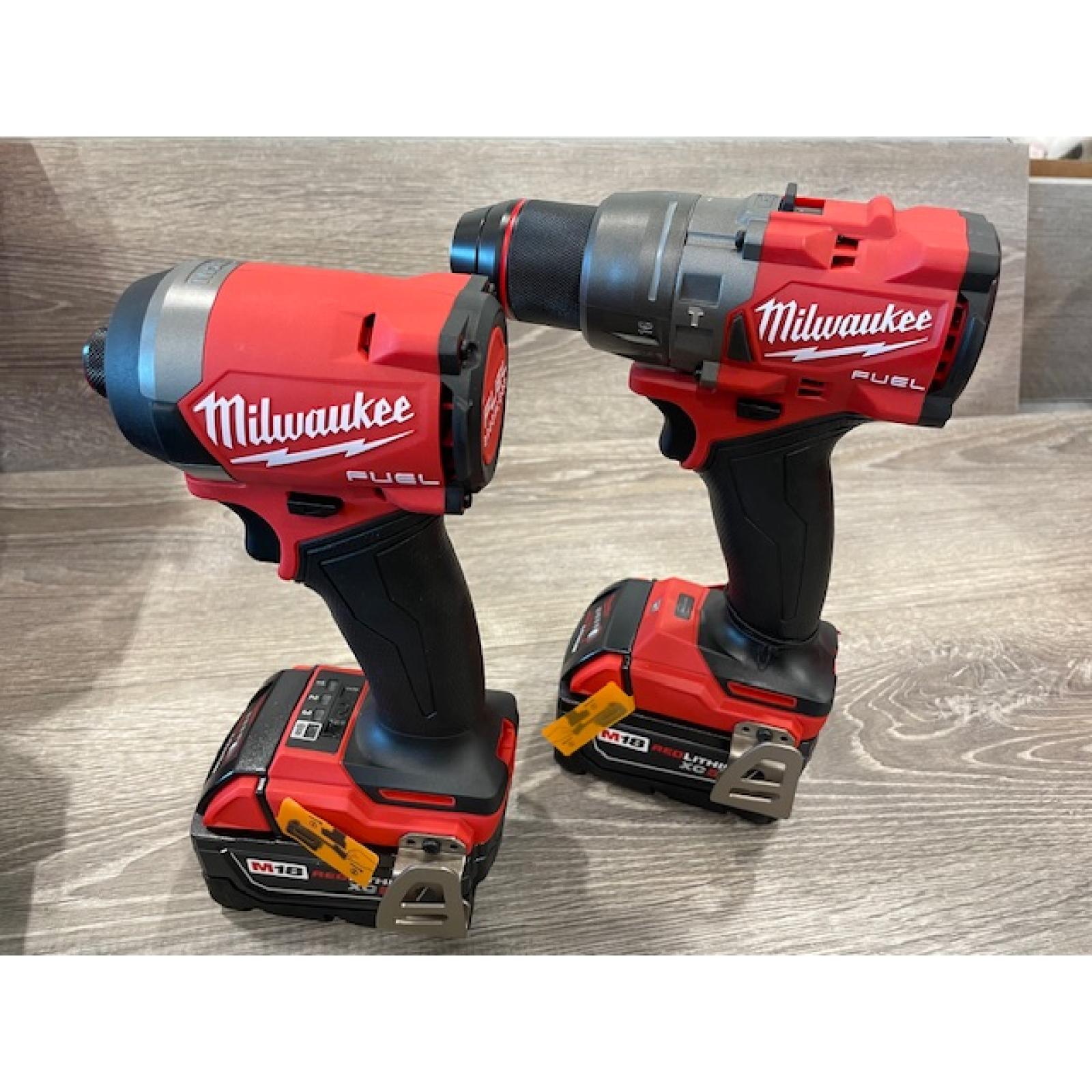 AS-IS Milwaukee FUEL 18V Lithium-Ion Brushless Cordless Hammer Drill and Impact Driver Combo Kit