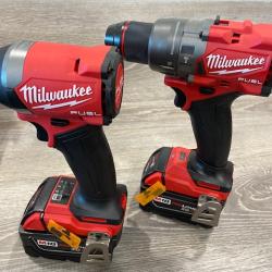 AS-IS Milwaukee FUEL 18V Lithium-Ion Brushless Cordless Hammer Drill and Impact Driver Combo Kit