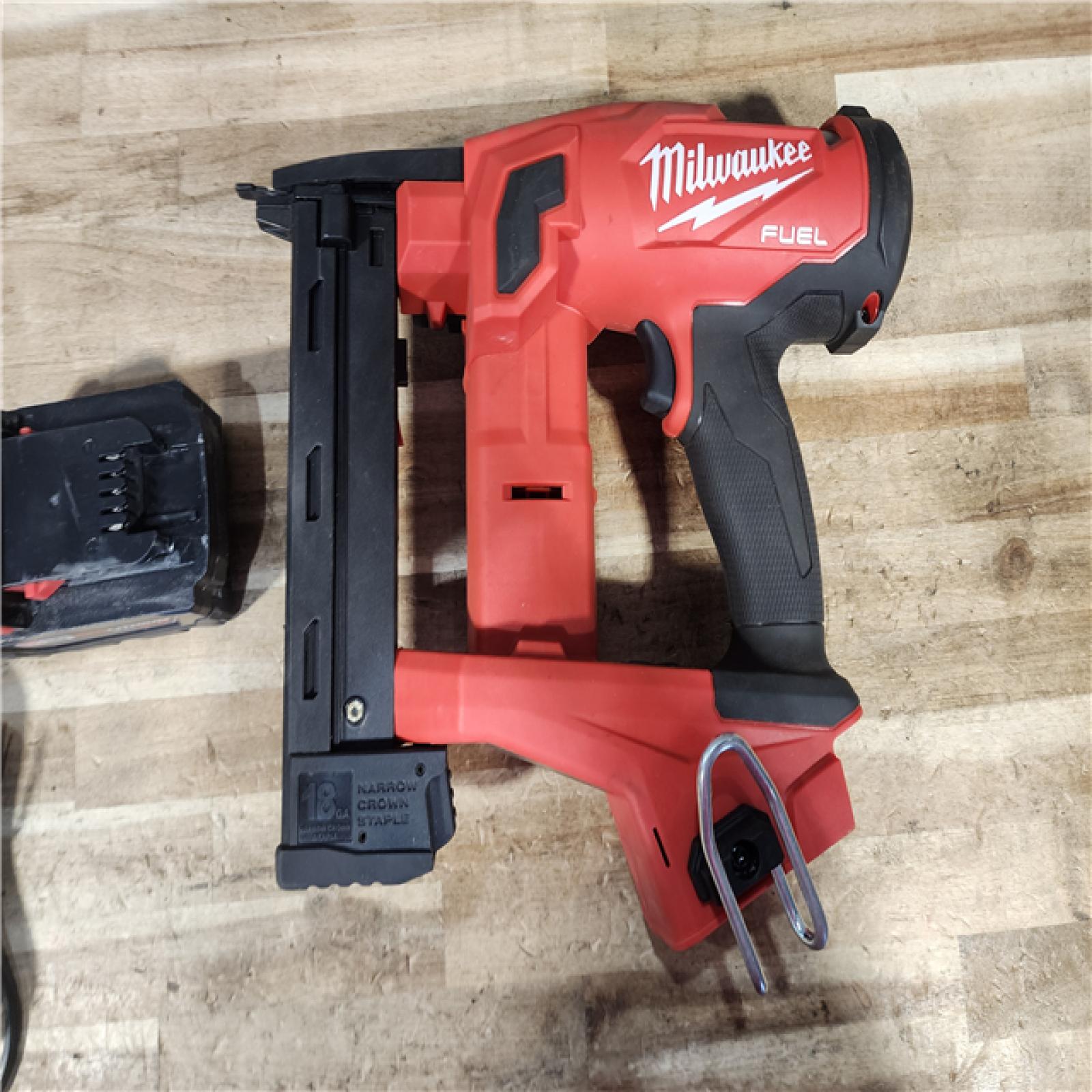 HOUSTON LOCATION - AS - IS Milwaukee FUEL 18-Volt Lithium-Ion Brushless Cordless 18-Gauge 1/4 in. Narrow Crown Stapler W/ BATTERY & CHARGER