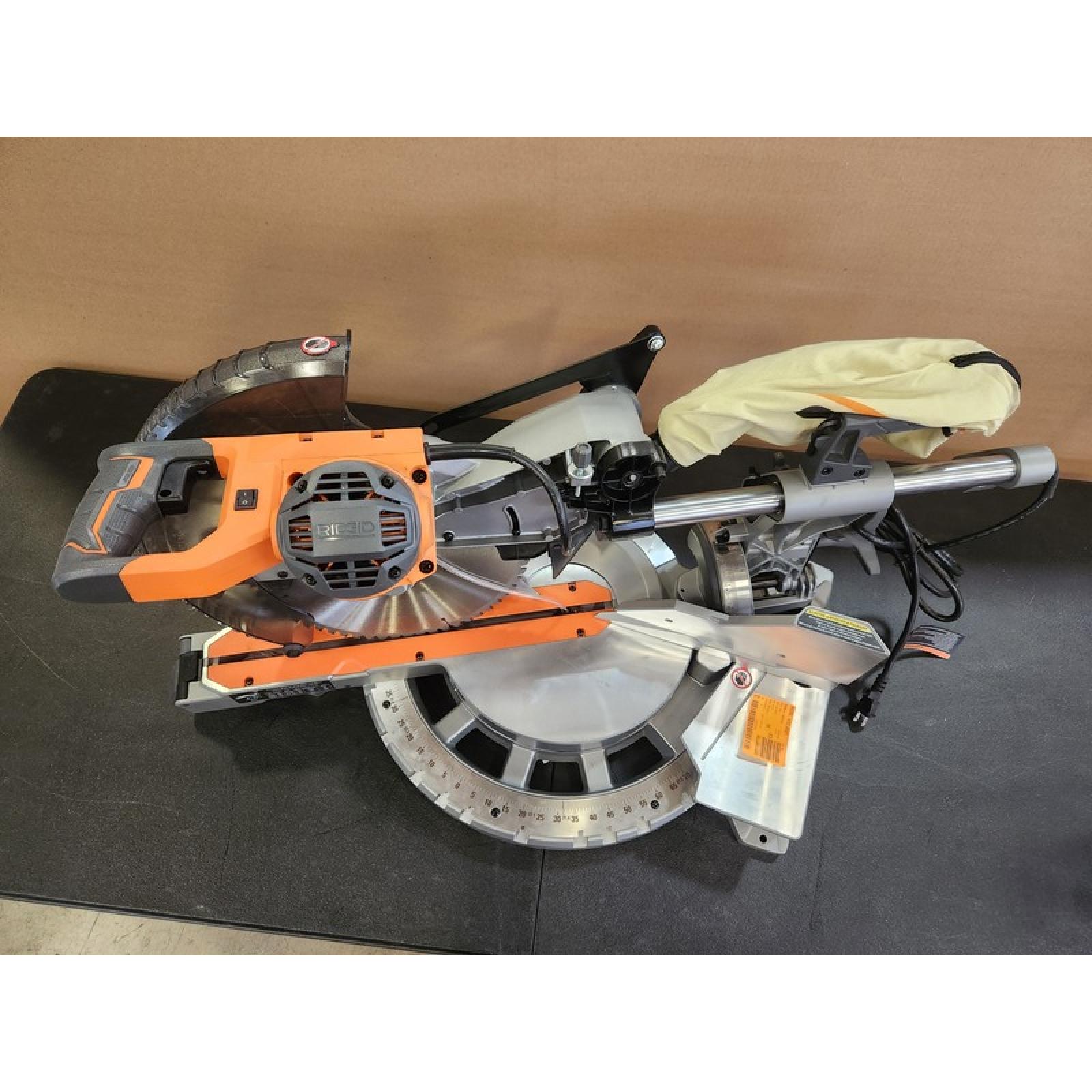 Phoenix NEW RIDGID 15 Amp Corded 12 in. Dual Bevel Sliding Miter Saw with 70 Deg. Miter Capacity and LED Cut Line Indicator
