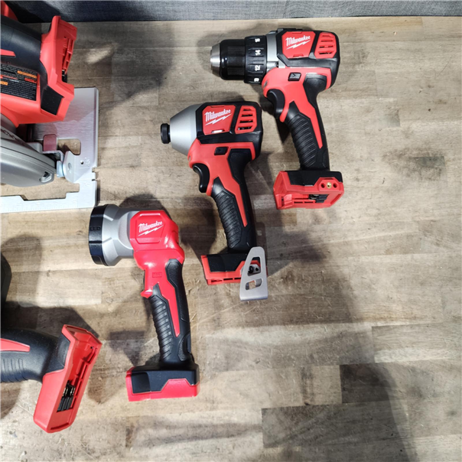 HOUSTON LOCATION - AS-IS (APPEARS LIKE NEW) Milwaukee M18 18-Volt Lithium-Ion Cordless Combo Tool Kit (5-Tool) with (1) 3.0Ah and (1) 1.5Ah Battery  (1) Charger  (1) Tool Bag