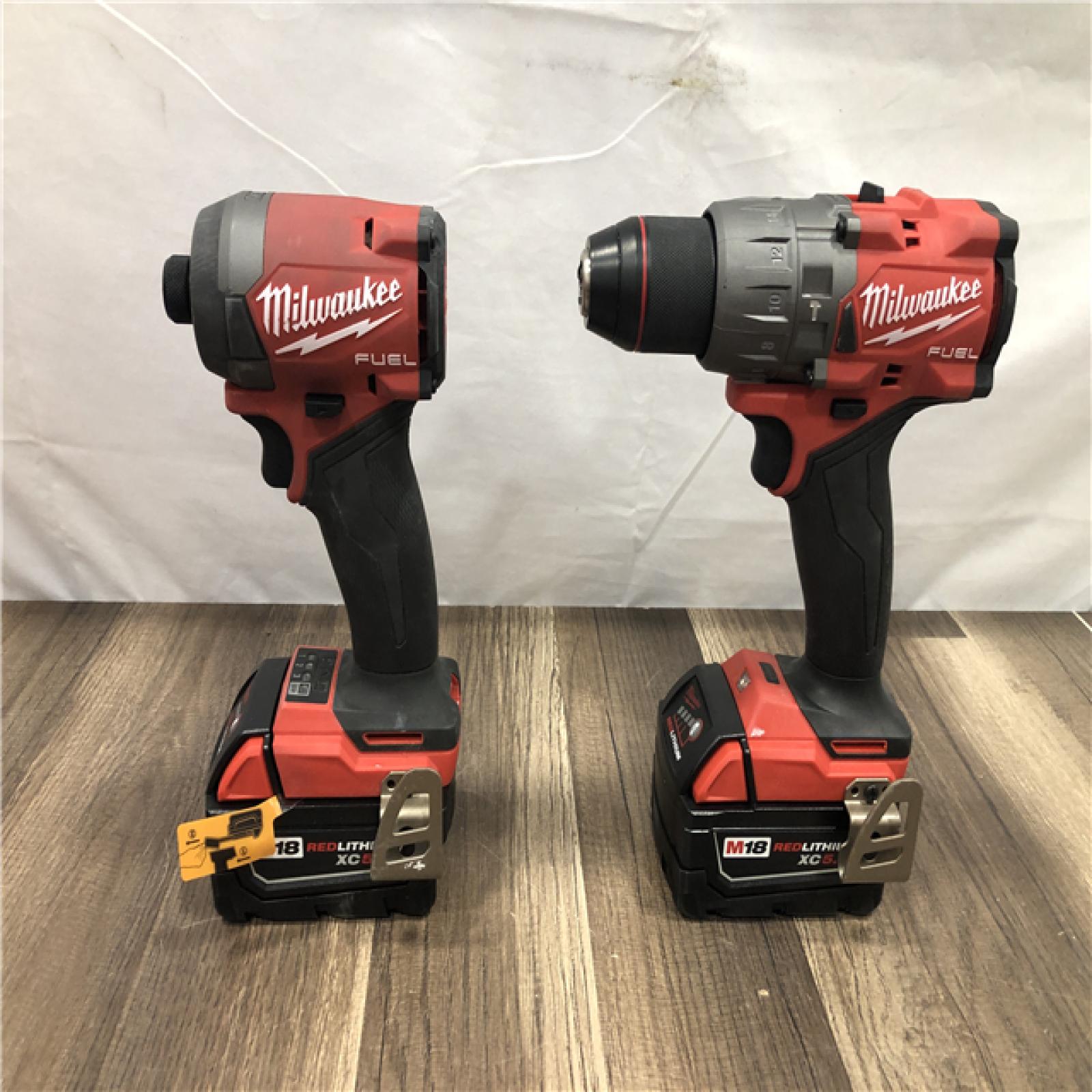 AS-IS Milwaukee FUEL 18V Lithium-Ion Brushless Cordless Hammer Drill and Impact Driver Combo Kit