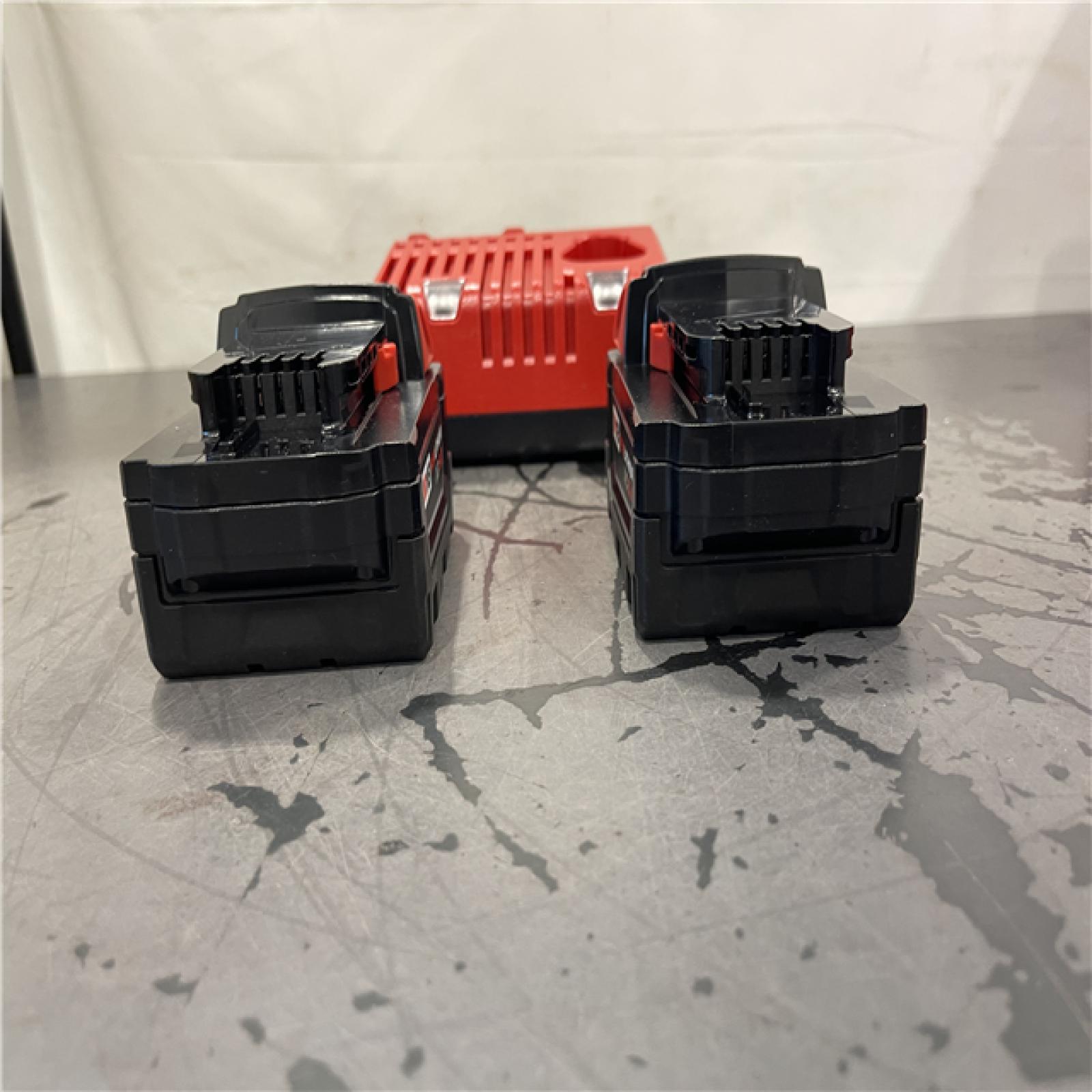 AS-IS- Milwaukee M18 18-Volt Lithium-Ion XC Starter Kit with Two 5.0Ah Batteries and Charger