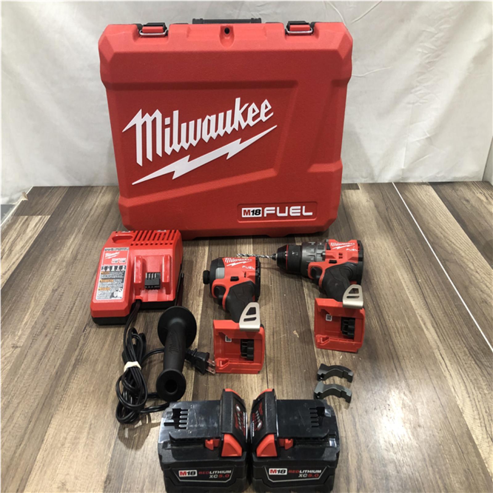 AS-IS Milwaukee FUEL 18V Lithium-Ion Brushless Cordless Hammer Drill and Impact Driver Combo Kit