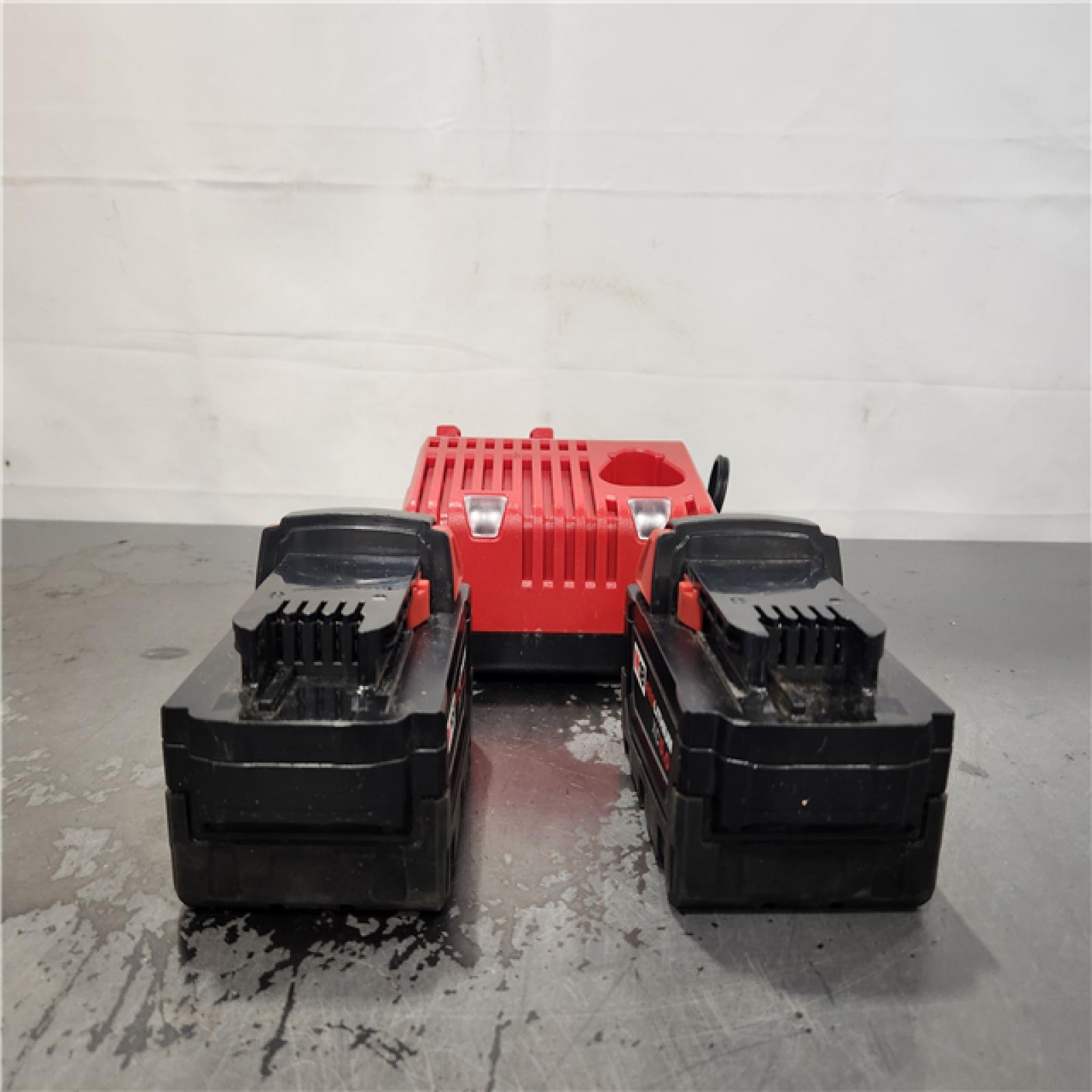 AS-IS- Milwaukee 18-Volt Lithium-Ion XC Starter Kit with Two 5.0Ah Batteries and Charger