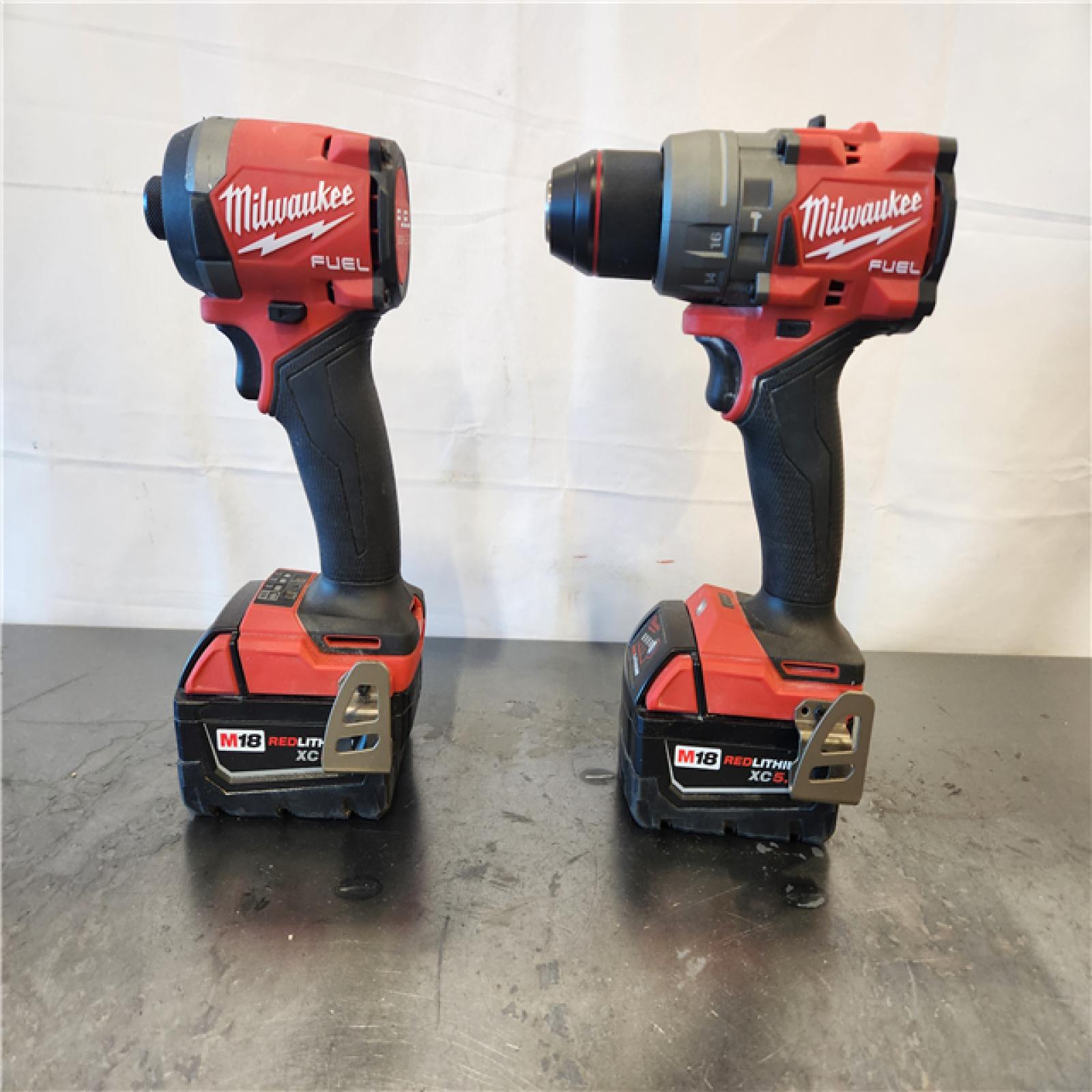 AS-IS- Milwaukee FUEL 18V Lithium-Ion Brushless Cordless Hammer Drill and Impact Driver Combo Kit