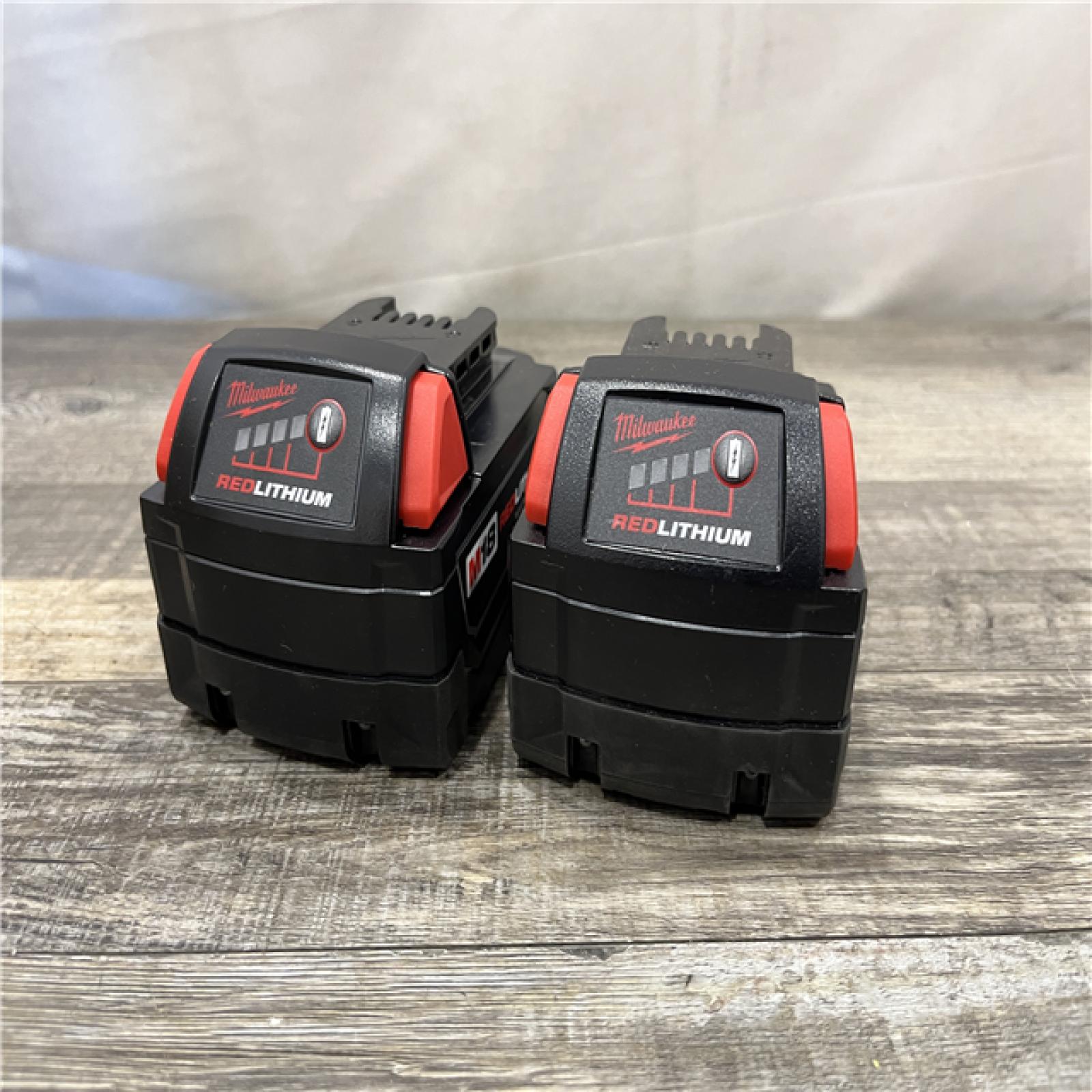 AS-IS Milwaukee 18-Volt Lithium-Ion XC Starter Kit with (2) 5.0Ah Batteries and Charger