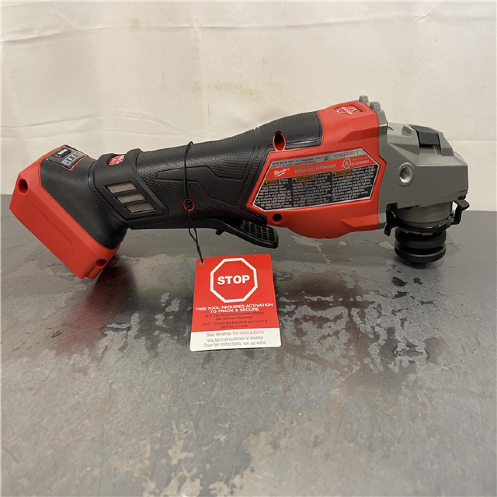 AS-IS - Milwaukee M18 FUEL ONE-KEY 18V Lithium-Ion Brushless Cordless 4-1/2 in./6 in. Variable Speed Braking Grinder