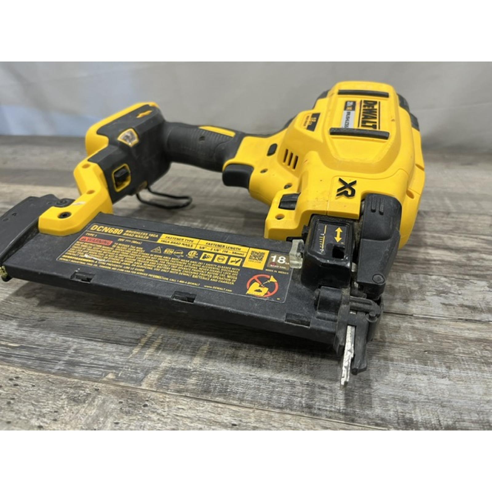 AS-IS DEWALT 20V MAX XR Lithium-Ion Electric Cordless 18-Gauge Brad Nailer (Tool Only)