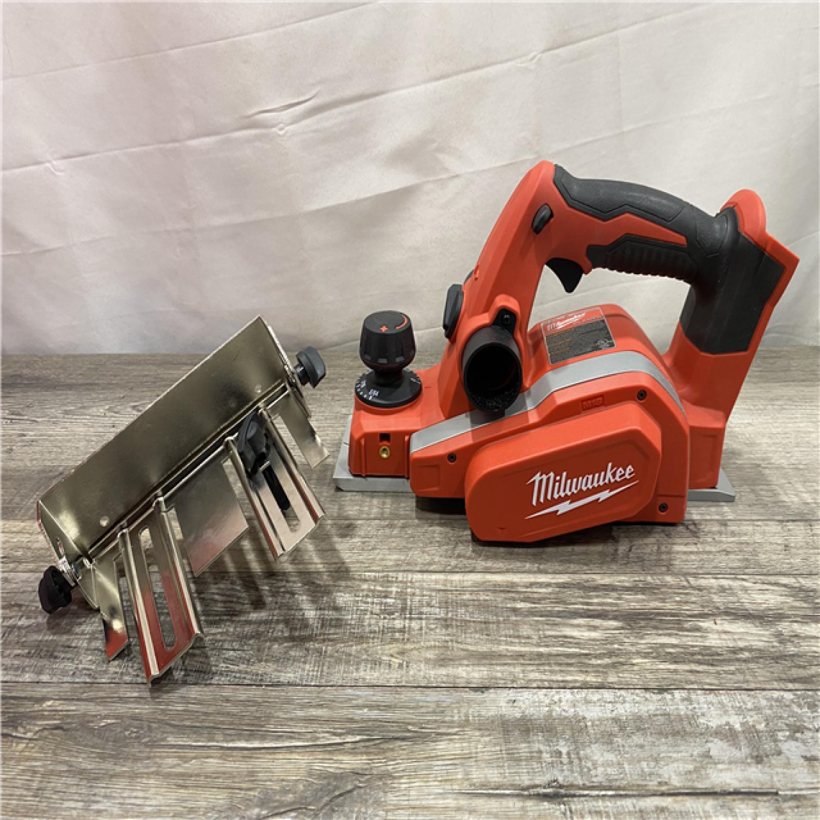 AS-IS Milwaukee 18V Lithium-Ion Cordless 3-1/4 in. Planer (Tool-Only)