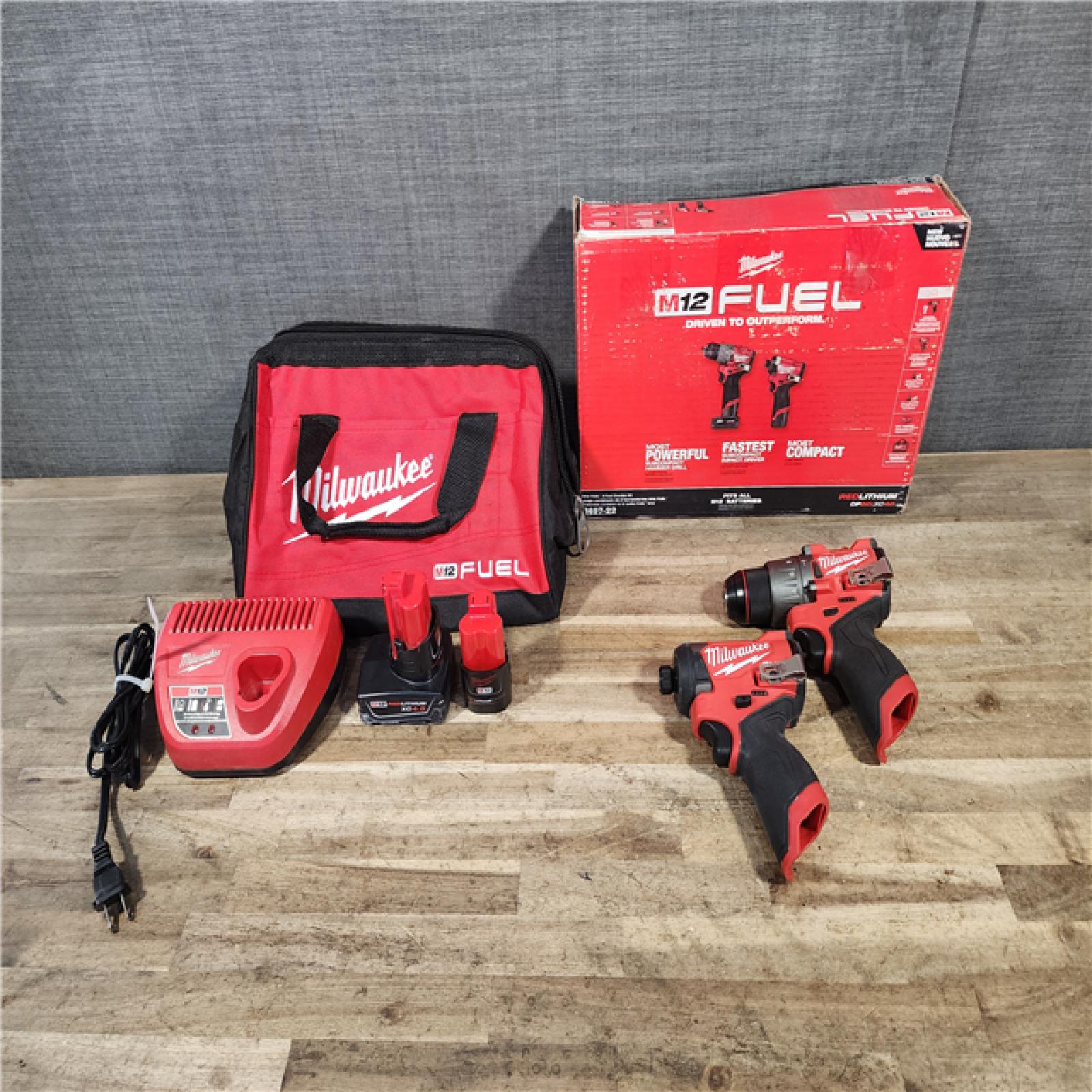 HOUSTON LOCATION - AS-IS Milwaukee FUEL 12-Volt Lithium-Ion Brushless Cordless Hammer Drill and Impact Driver Combo Kit