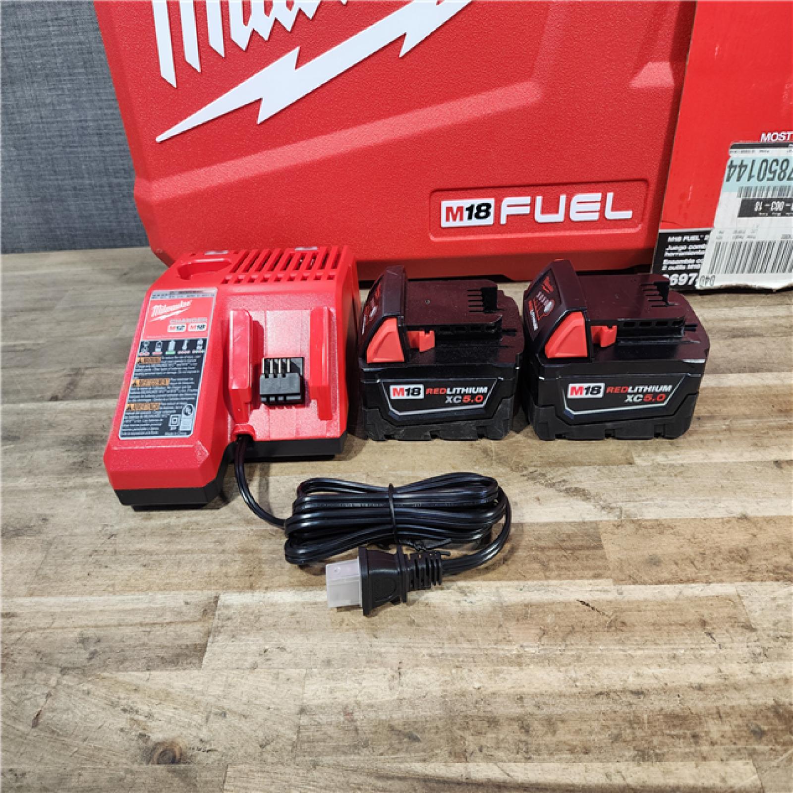 HOUSTON LOCATION - AS-IS Milwaukee  FUEL 18V Lithium-Ion Brushless Cordless Hammer Drill and Impact Driver Combo Kit