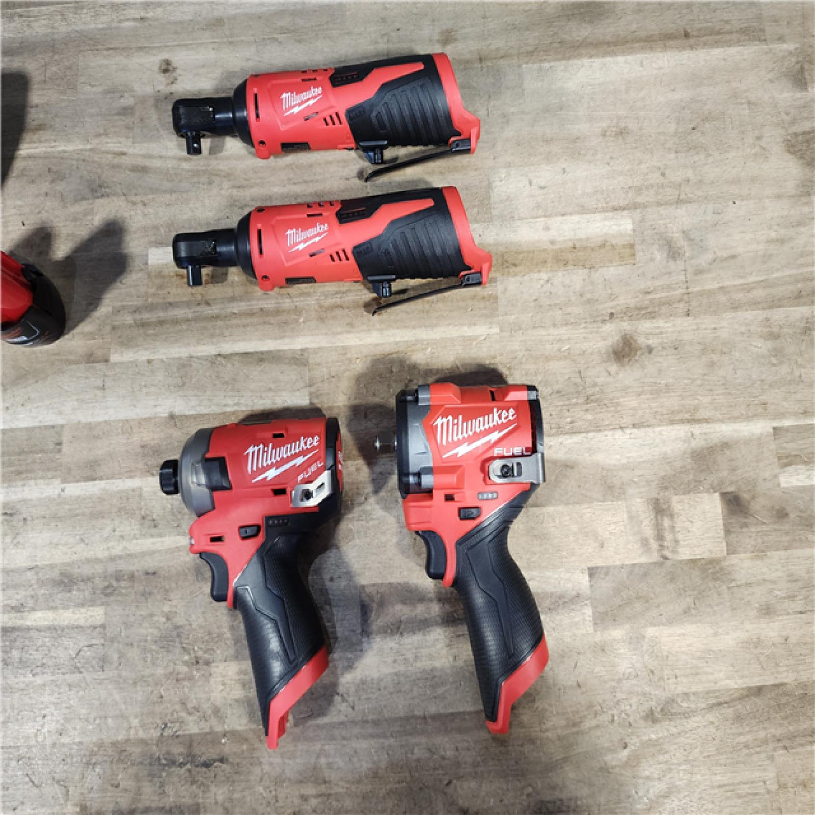 HOUSTON LOCATION - AS-IS MILWAUKEE 4 TOOL COMBO KIT W/ (2) BATTERY & CHARGER