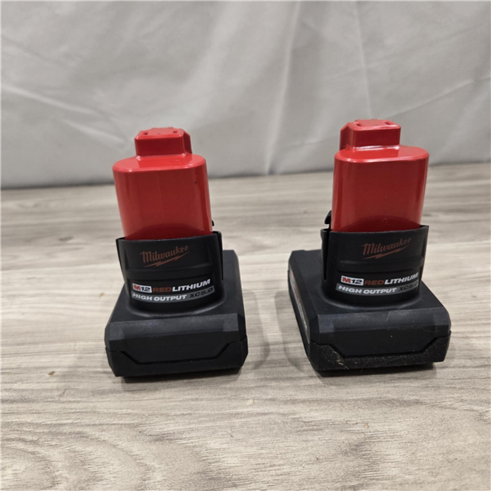 AS-IS Milwaukee M12 12V Lithium-Ion XC High Output 5.0 Ah Battery Pack (2-Pack) Starter Kit