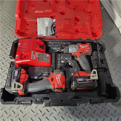 Houston location- AS-IS Milwaukee M18 FUEL 1/2 Hammer Driller/Driver &1/4 Hex Impact Driver (2-Tool) Combo Kit