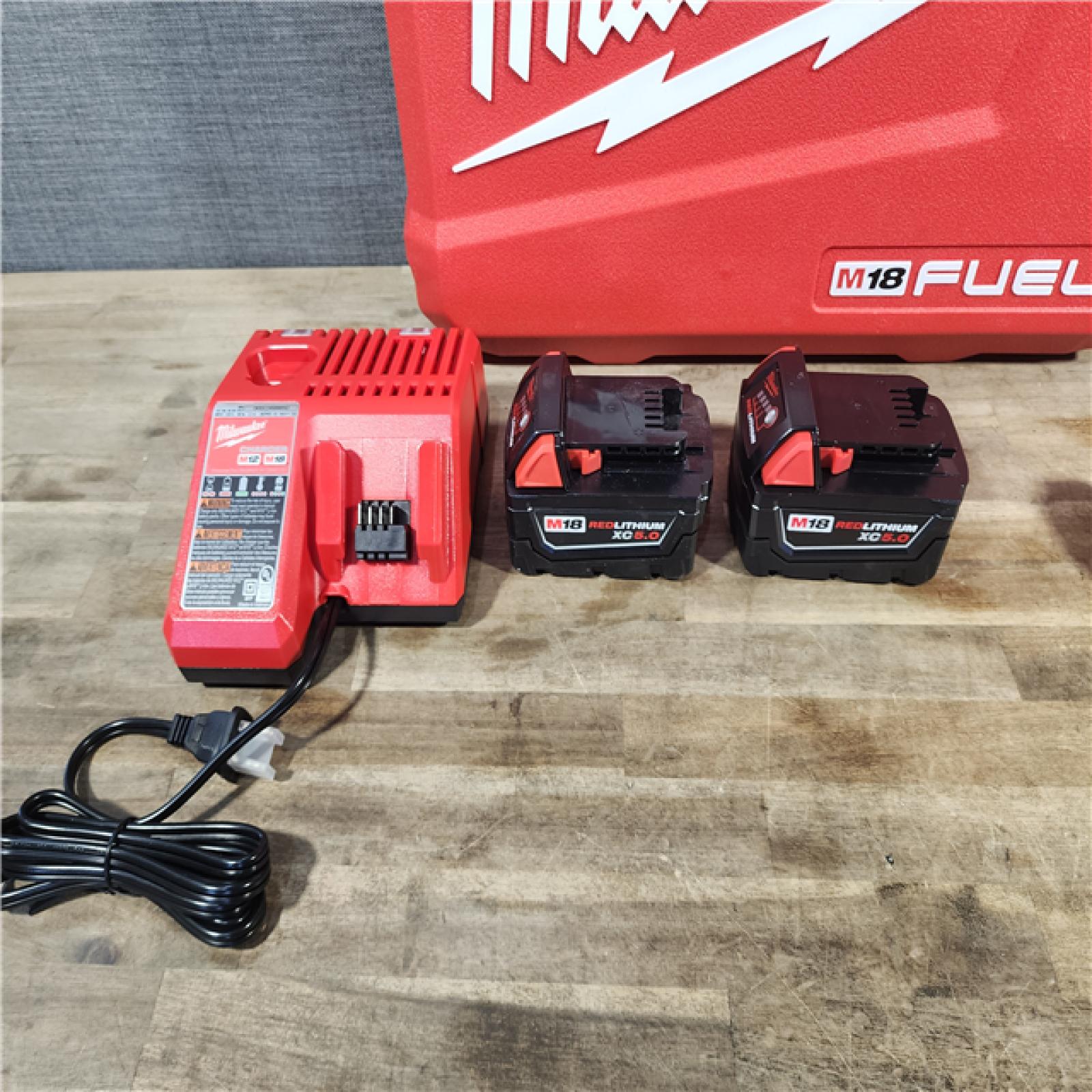HOUSTON LOCATION - AS-IS (APPEARS LIKE NEW) MILWAUKEE FUEL 18V Lithium-Ion Brushless Cordless Hammer Drill and Impact Driver Combo Kit (2-Tool) with 2 Batteries