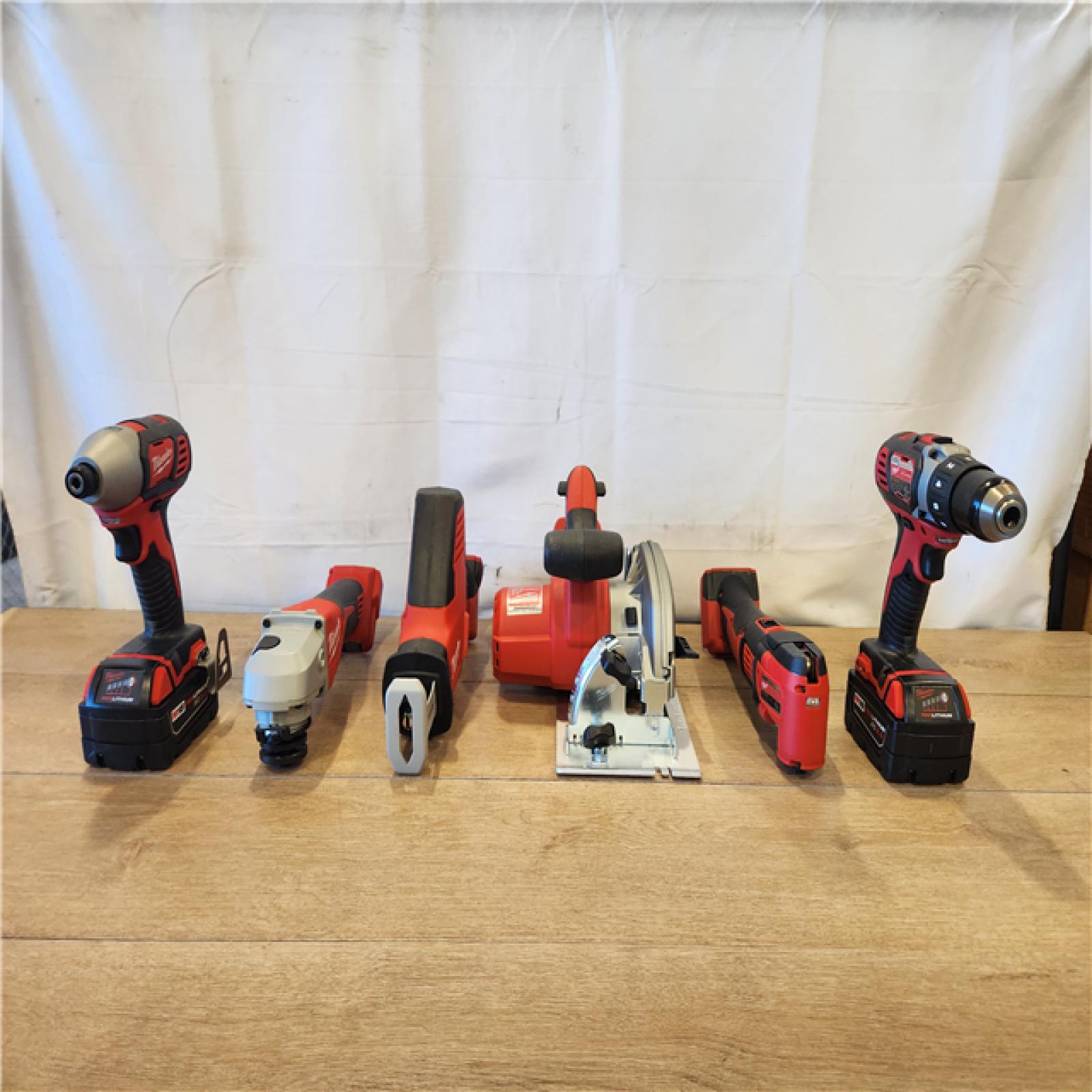 AS-IS- M18 18-Volt Lithium-Ion Cordless Combo Kit 7-Tool with 2-Batteries  Charger and Tool Bag