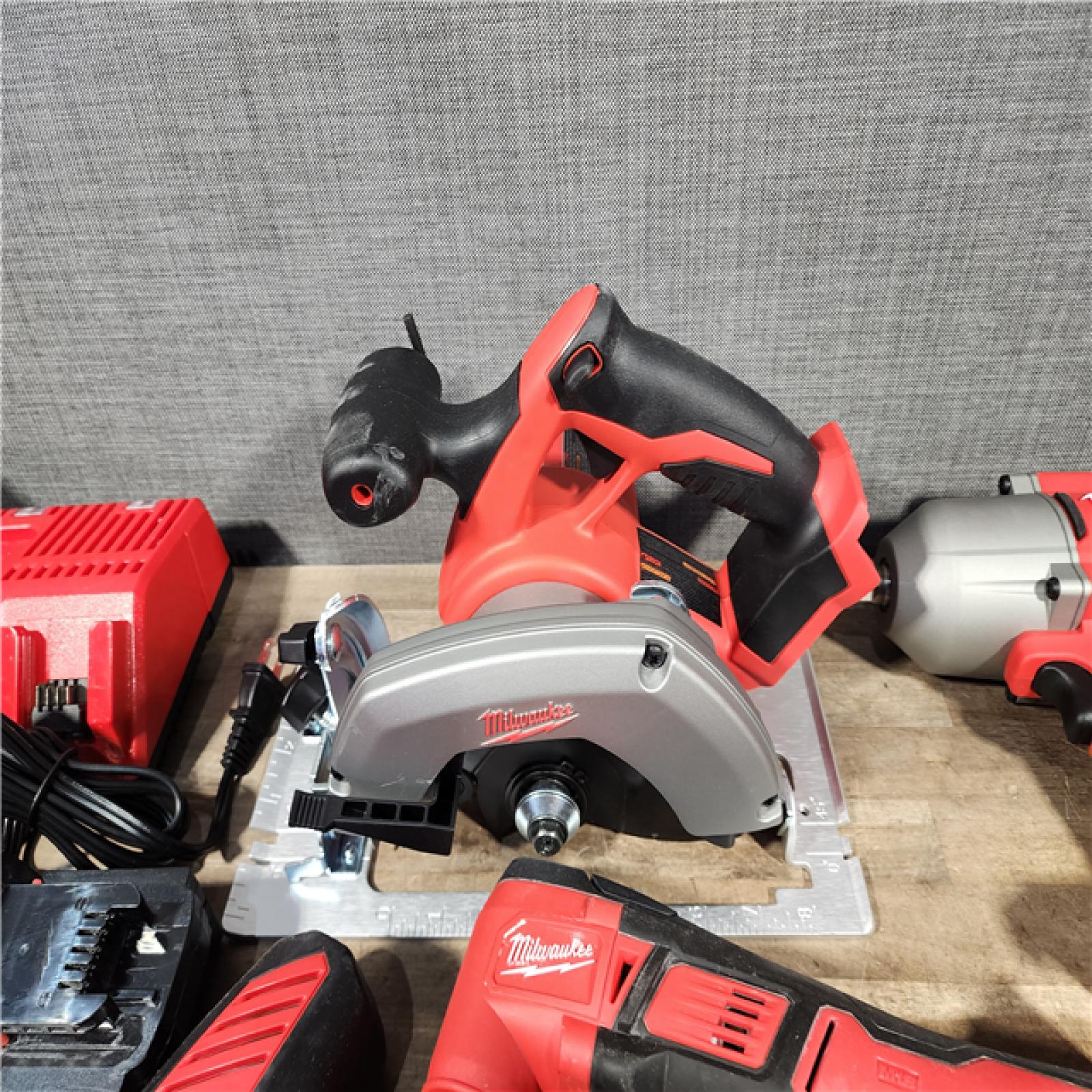 HOUSTON LOCATION - AS-IS Milwaukee M18 18-Volt Lithium-Ion Cordless Combo Kit (9-Tool) with (2) Batteries  Charger  and Tool Bag