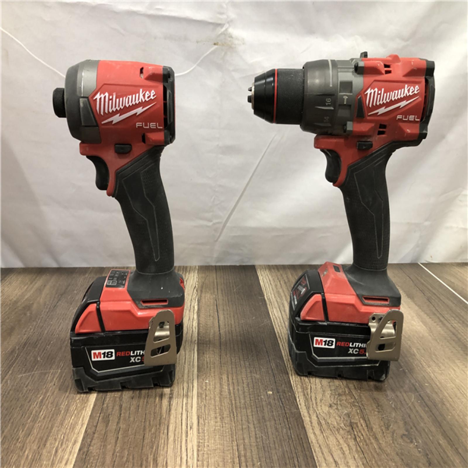 AS-IS Milwaukee FUEL 18V Lithium-Ion Brushless Cordless Hammer Drill and Impact Driver Combo Kit